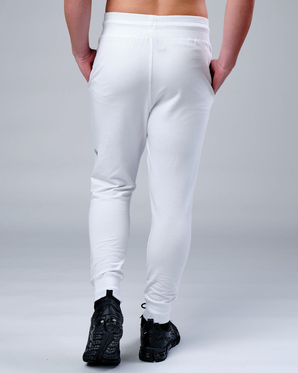 Model wearing Rival FLXFleece Track Pant - White