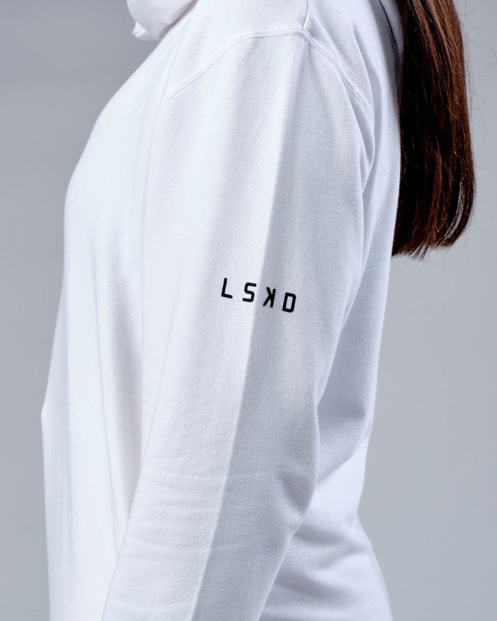 Model wearing Unisex Rival FLXFleece Training Fit Hoodie - White