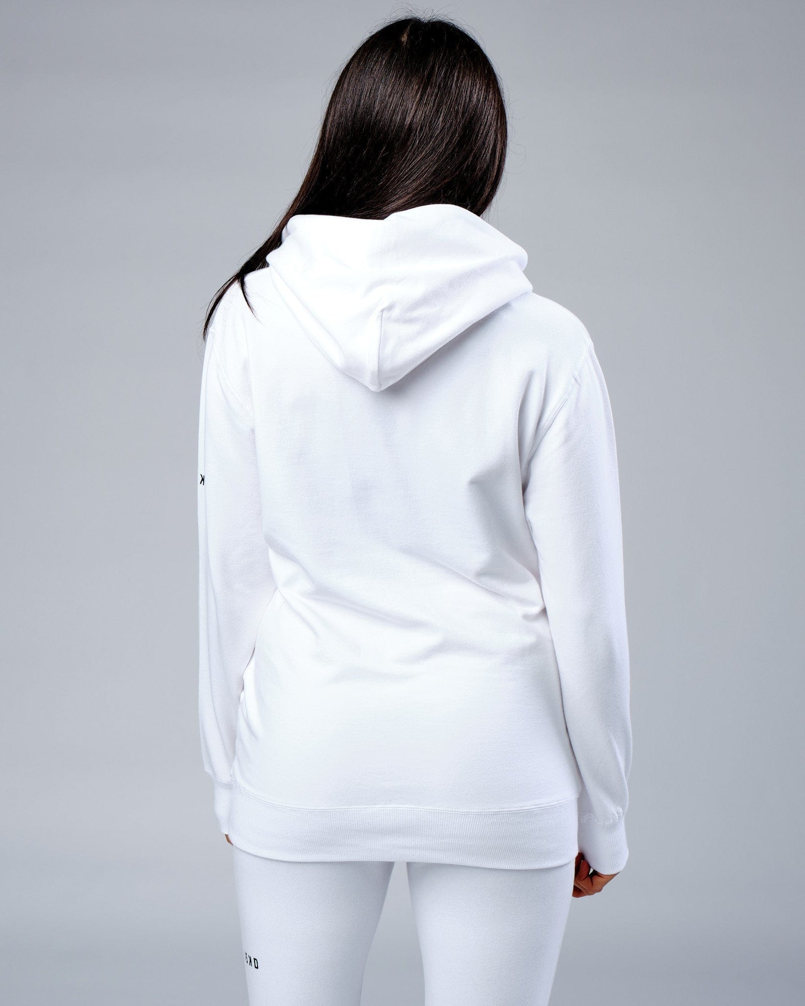 Model wearing Unisex Rival FLXFleece Training Fit Hoodie - White