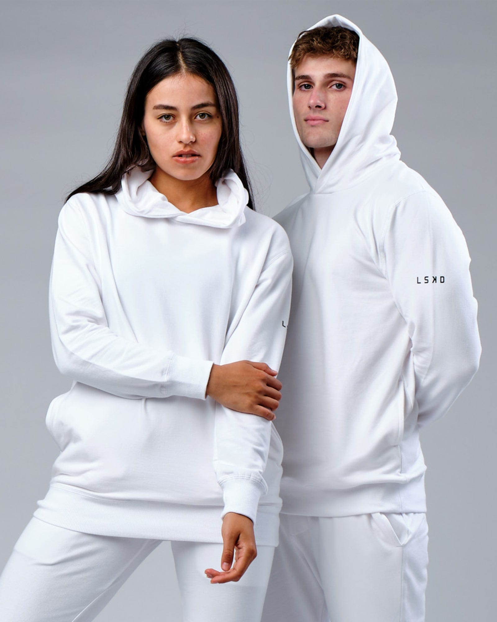 Model wearing Unisex Rival FLXFleece Training Fit Hoodie - White