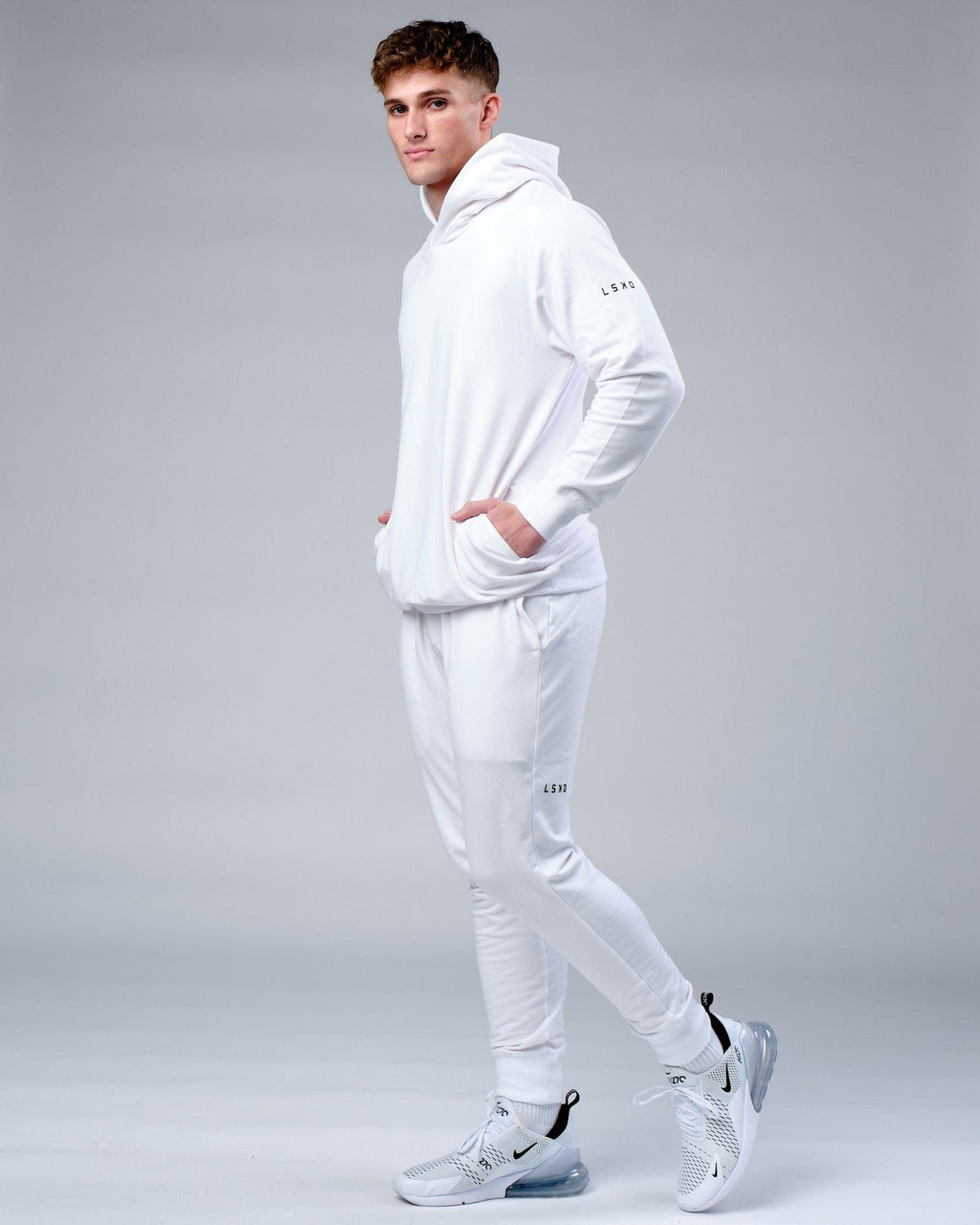 Model wearing Rival FLXFleece Training Fit Hoodie - White