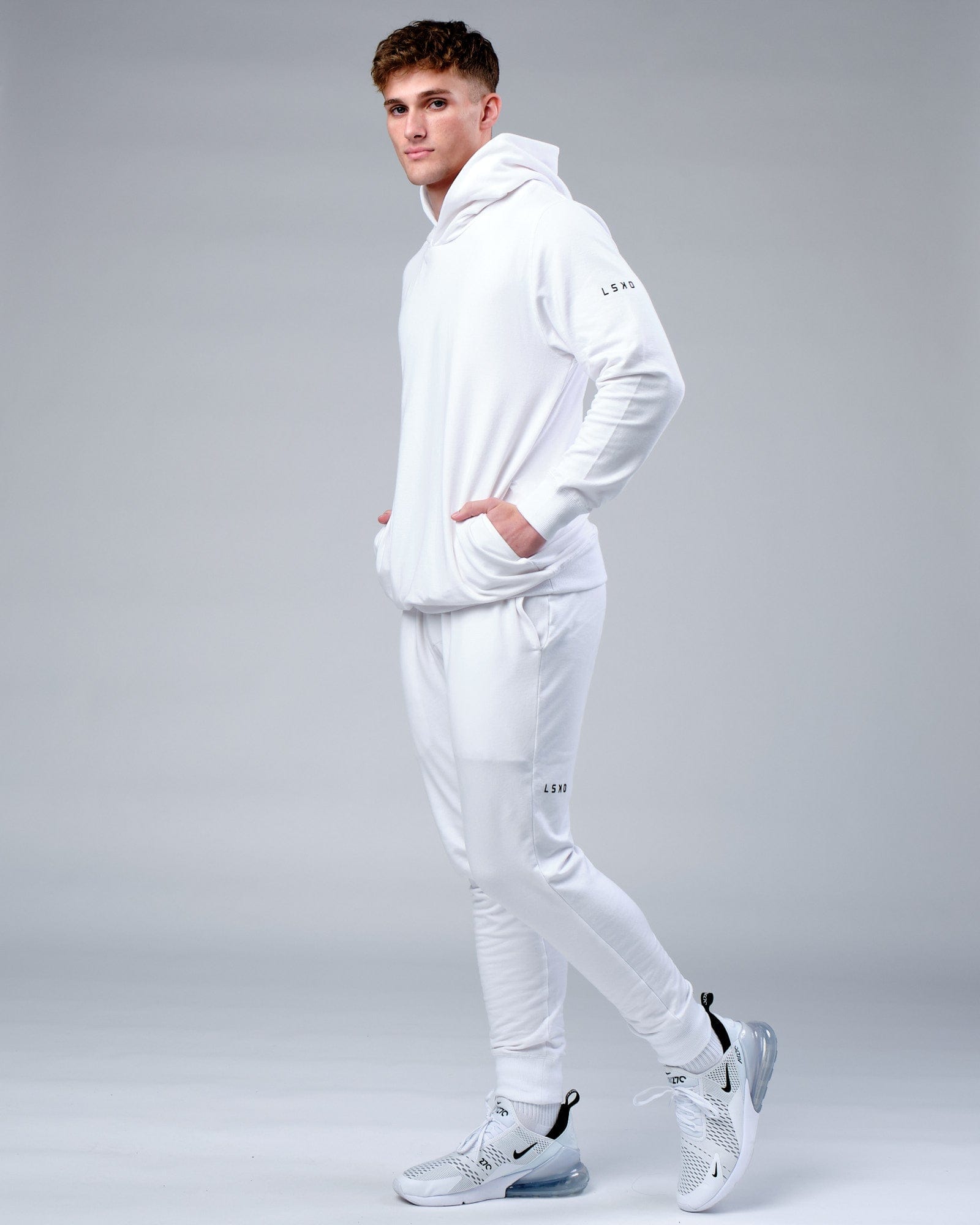 Model wearing Rival FLXFleece Training Fit Hoodie - White