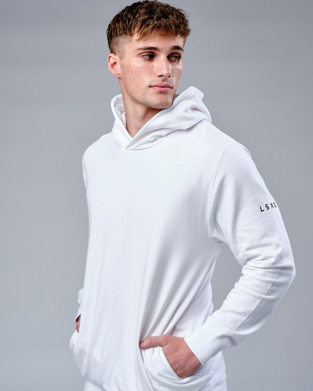 Model wearing Rival FLXFleece Training Fit Hoodie - White