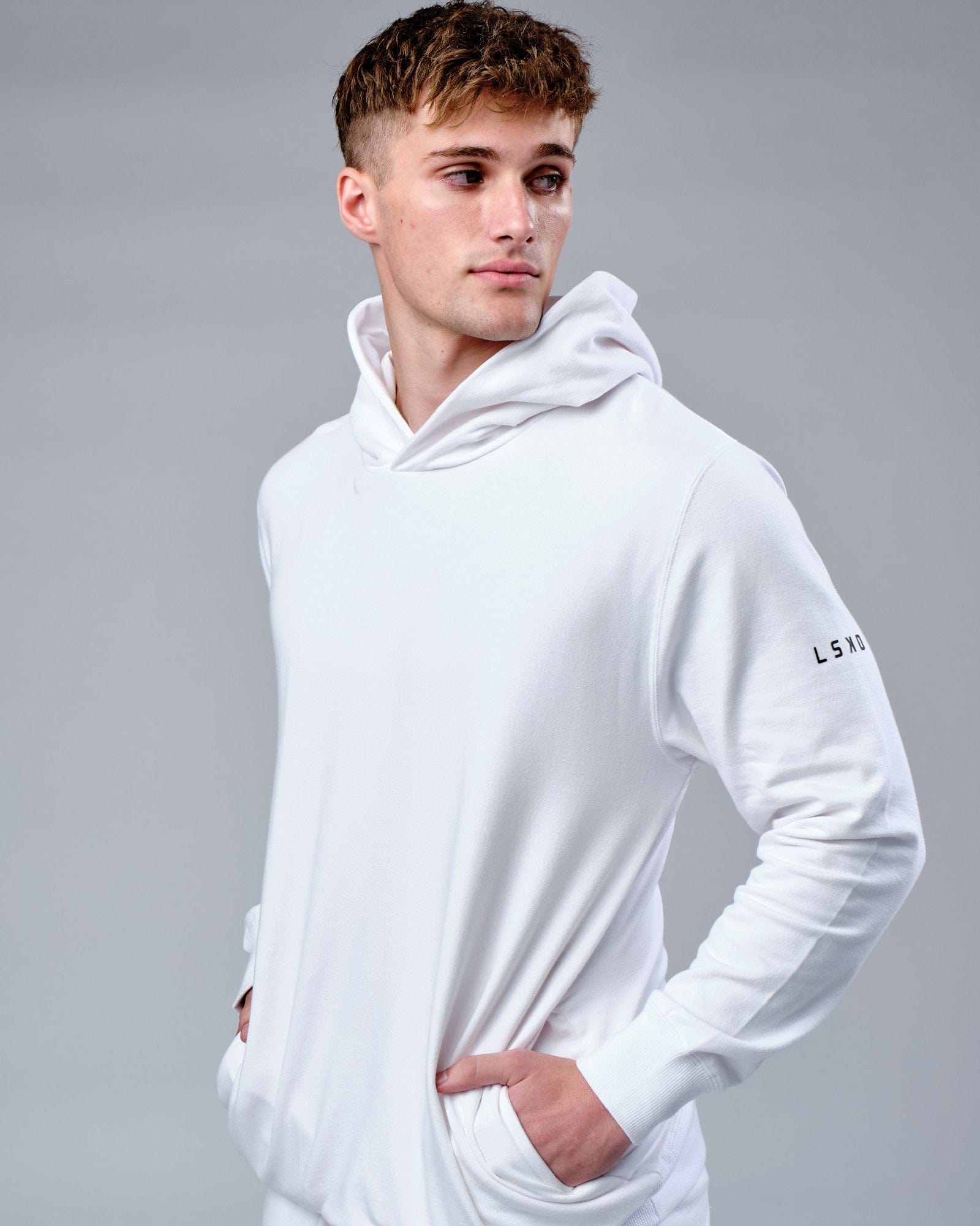 Model wearing Rival FLXFleece Training Fit Hoodie - White