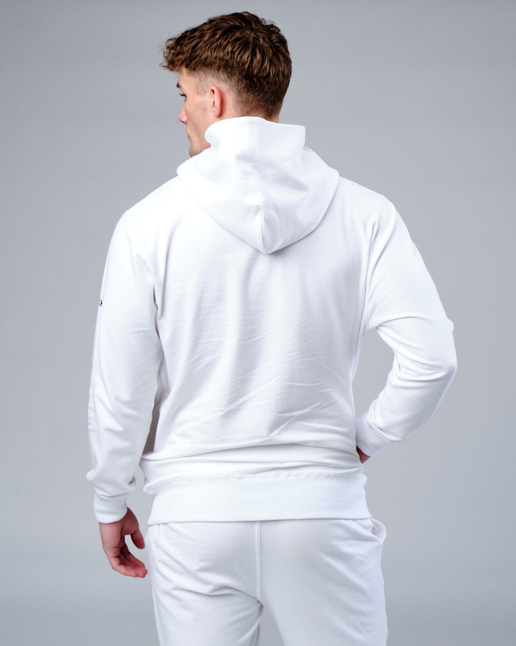Model wearing Rival FLXFleece Training Fit Hoodie - White