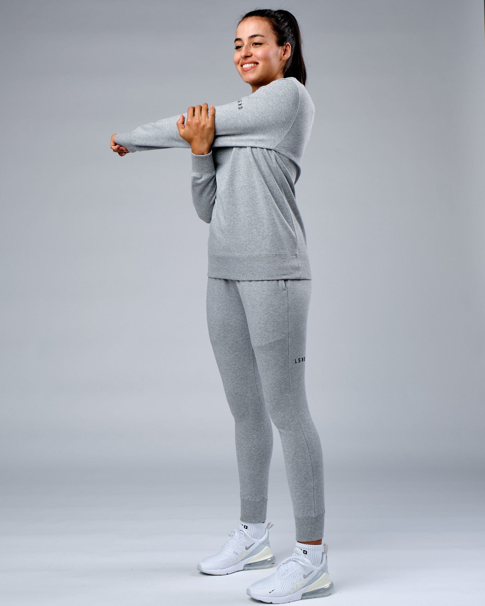 Model wearing Unisex Rival FLXFleece Training Fit Sweater - Lt Grey Marl