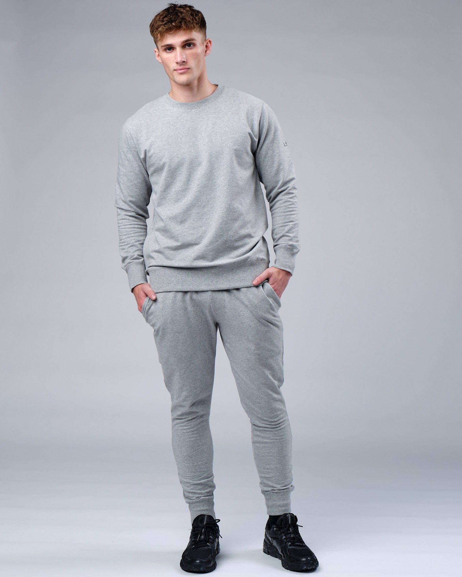 Model wearing Rival FLXFleece Training Fit Sweater - Lt Grey Marl