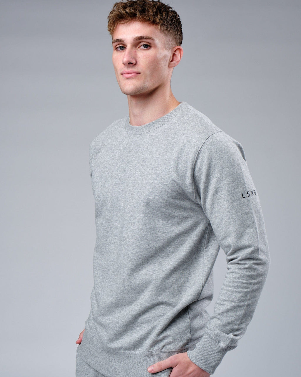 Model wearing Rival FLXFleece Training Fit Sweater - Lt Grey Marl