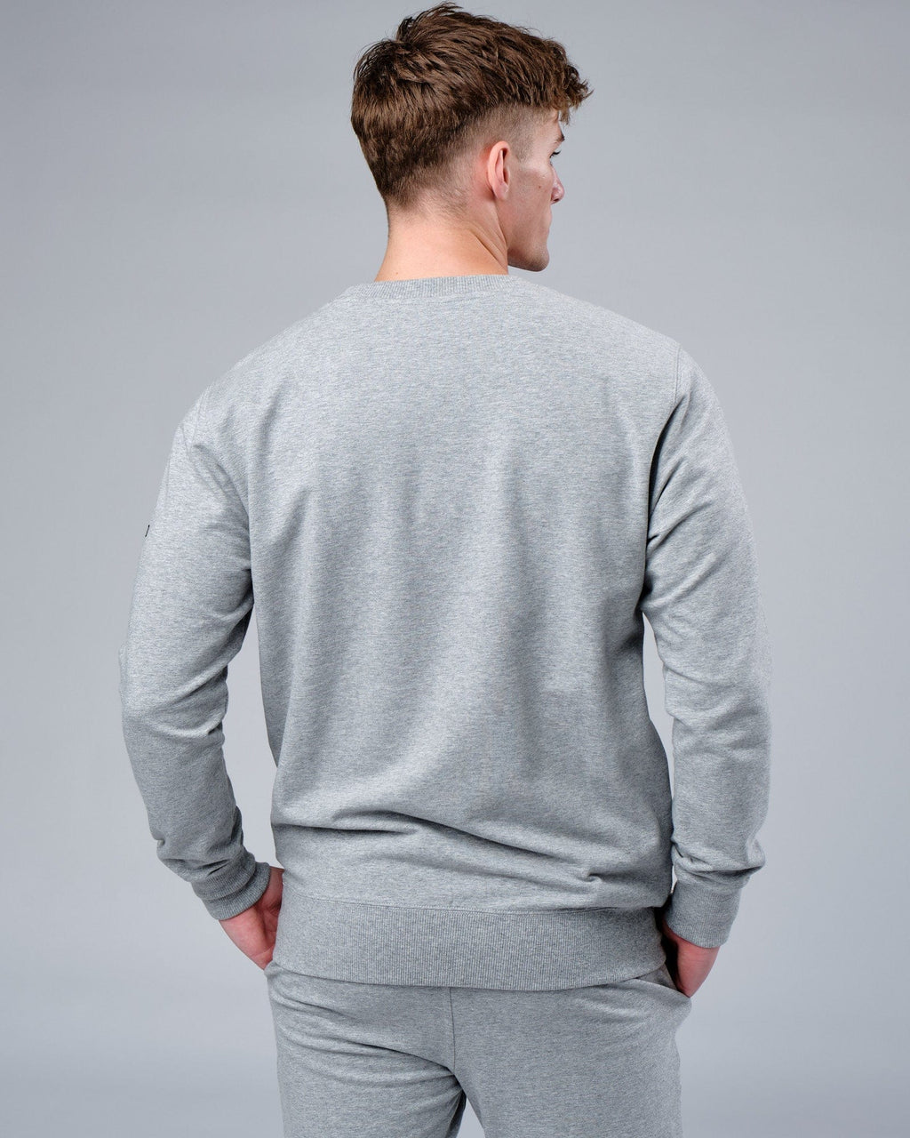 Model wearing Rival FLXFleece Training Fit Sweater - Lt Grey Marl