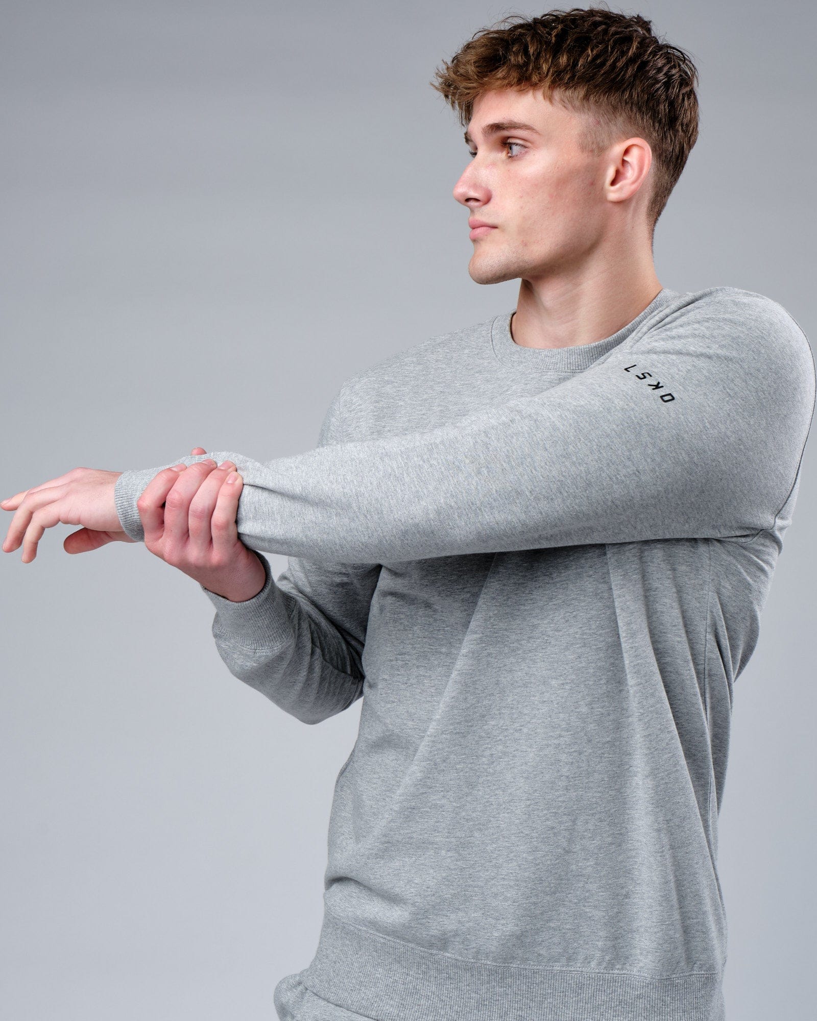 Model wearing Rival FLXFleece Training Fit Sweater - Lt Grey Marl