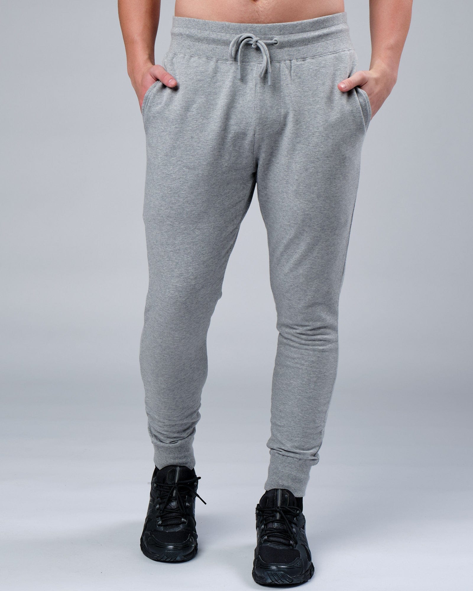 Model wearing Rival FLXFleece Track Pant - Lt Grey Marl
