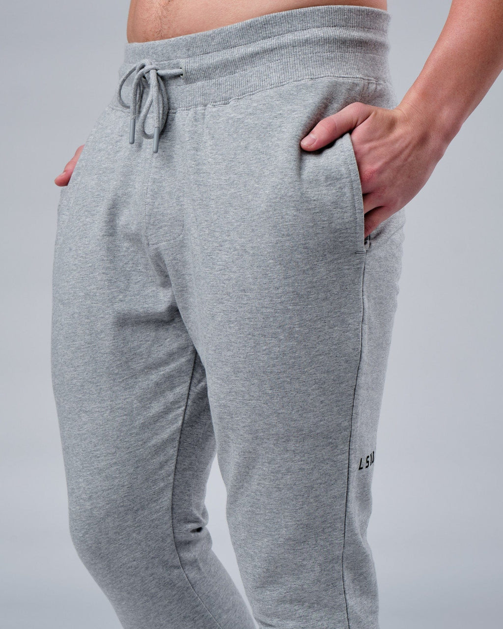 Model wearing Rival FLXFleece Track Pant - Lt Grey Marl