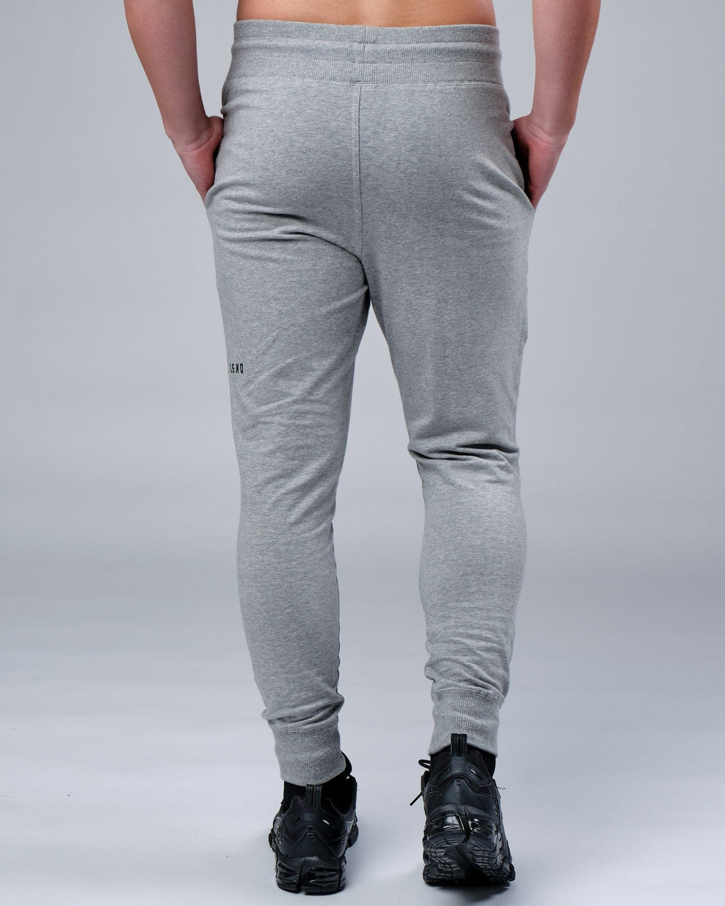 Model wearing Rival FLXFleece Track Pant - Lt Grey Marl