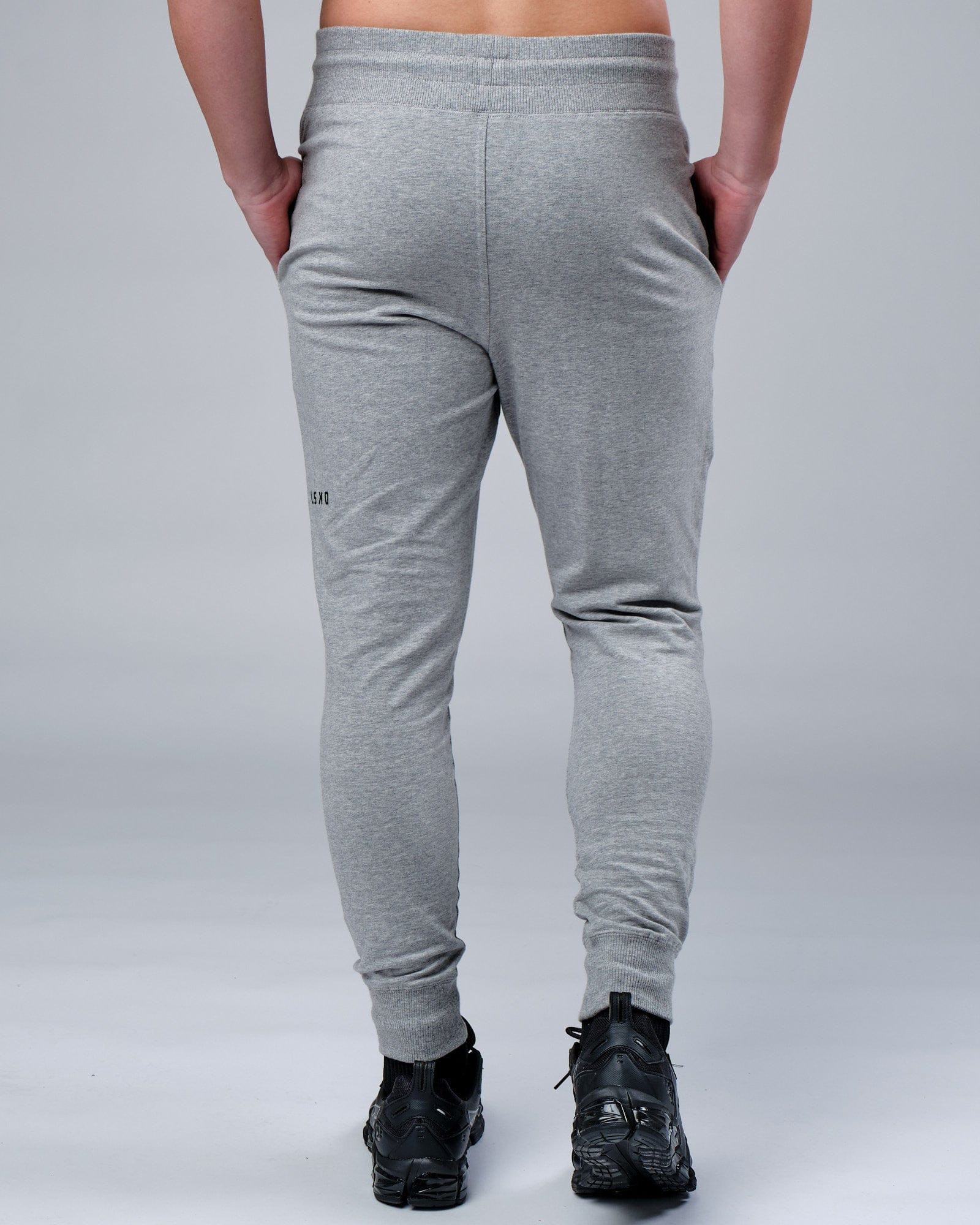 Model wearing Rival FLXFleece Track Pant - Lt Grey Marl