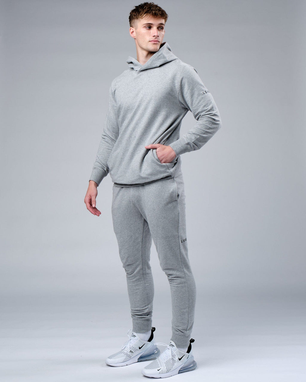 Model wearing Rival FLXFleece Training Fit Hoodie - Lt Grey Marl