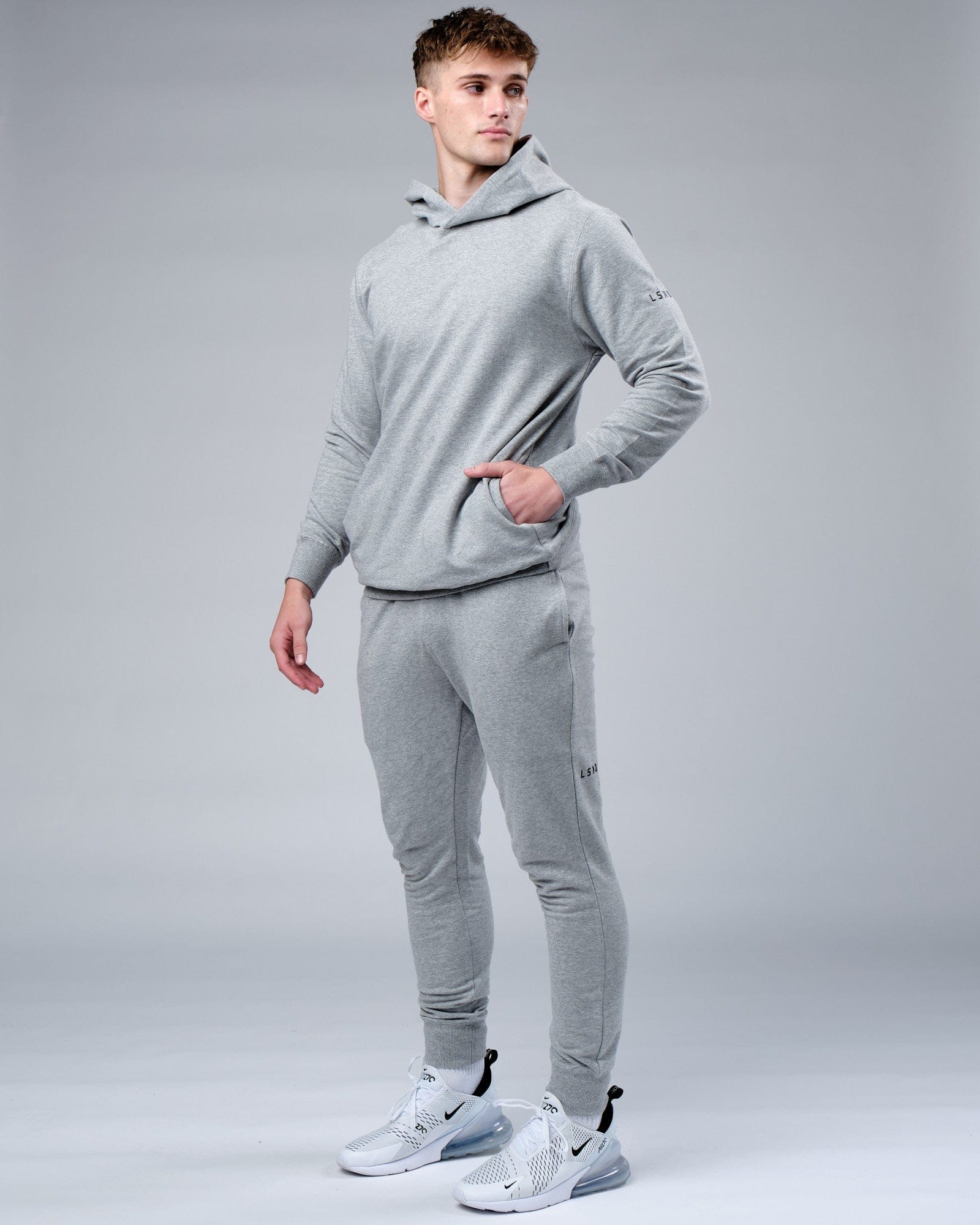 Model wearing Rival FLXFleece Training Fit Hoodie - Lt Grey Marl