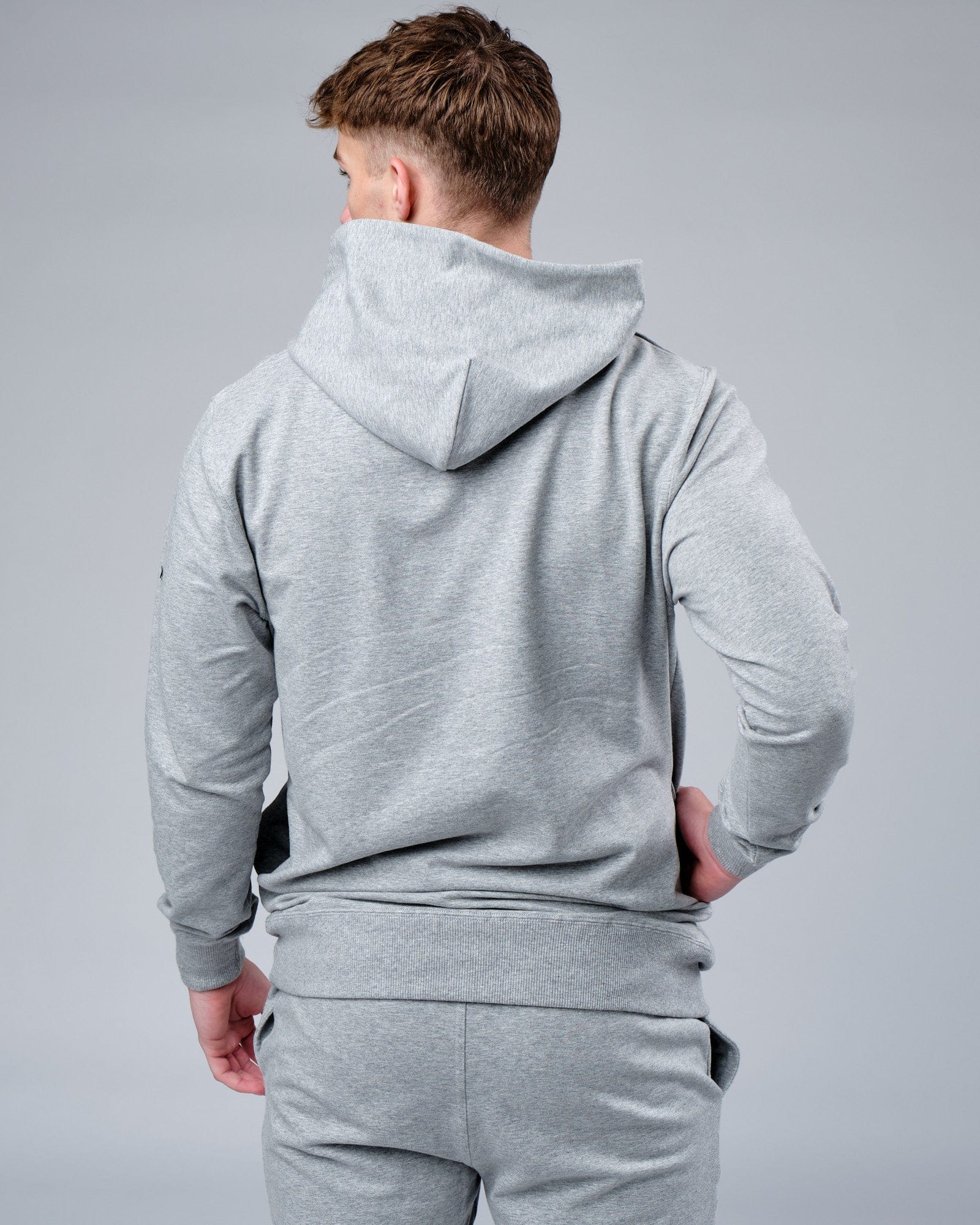 Model wearing Rival FLXFleece Training Fit Hoodie - Lt Grey Marl