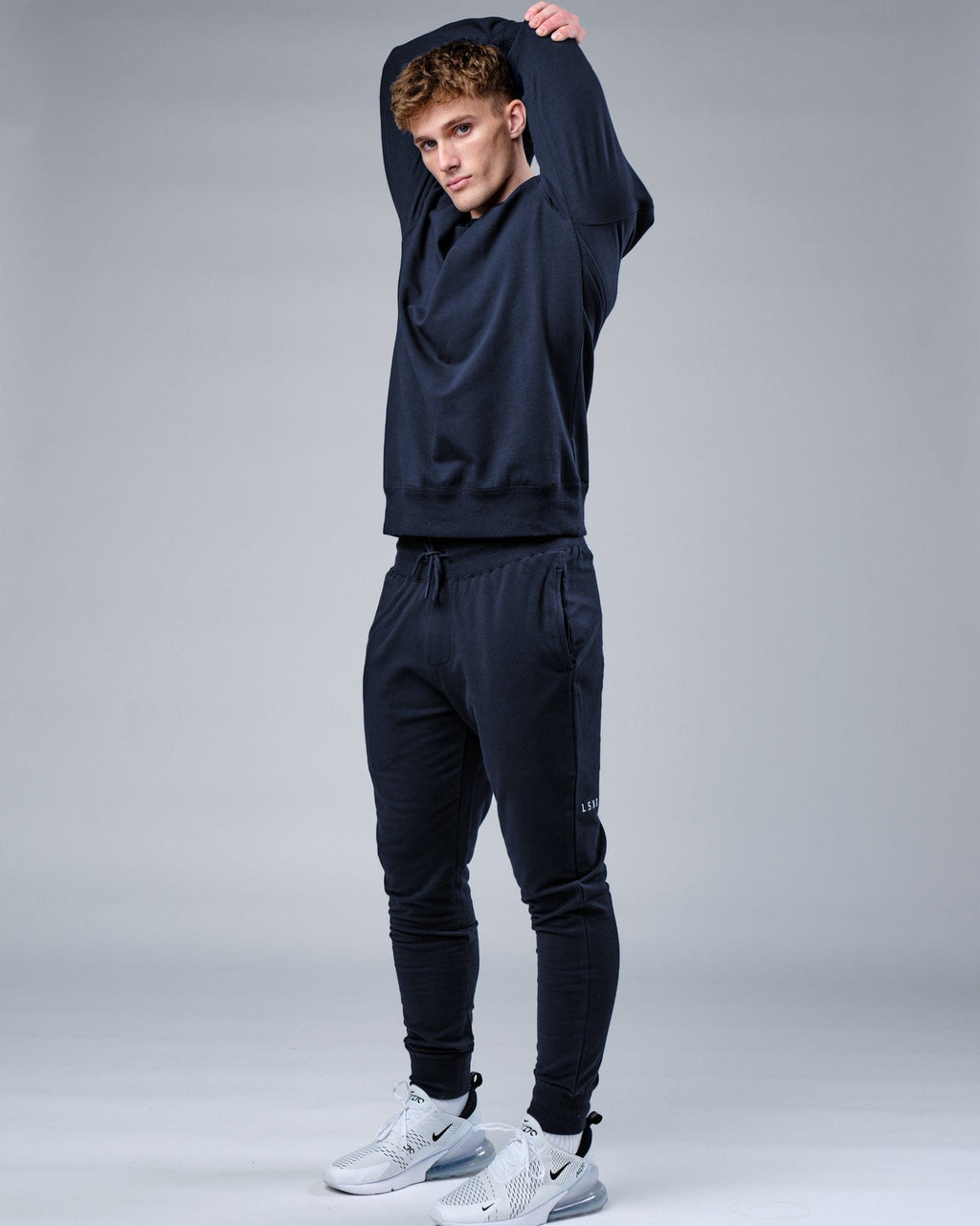 Model wearing Rival FLXFleece Track Pant - Carbon