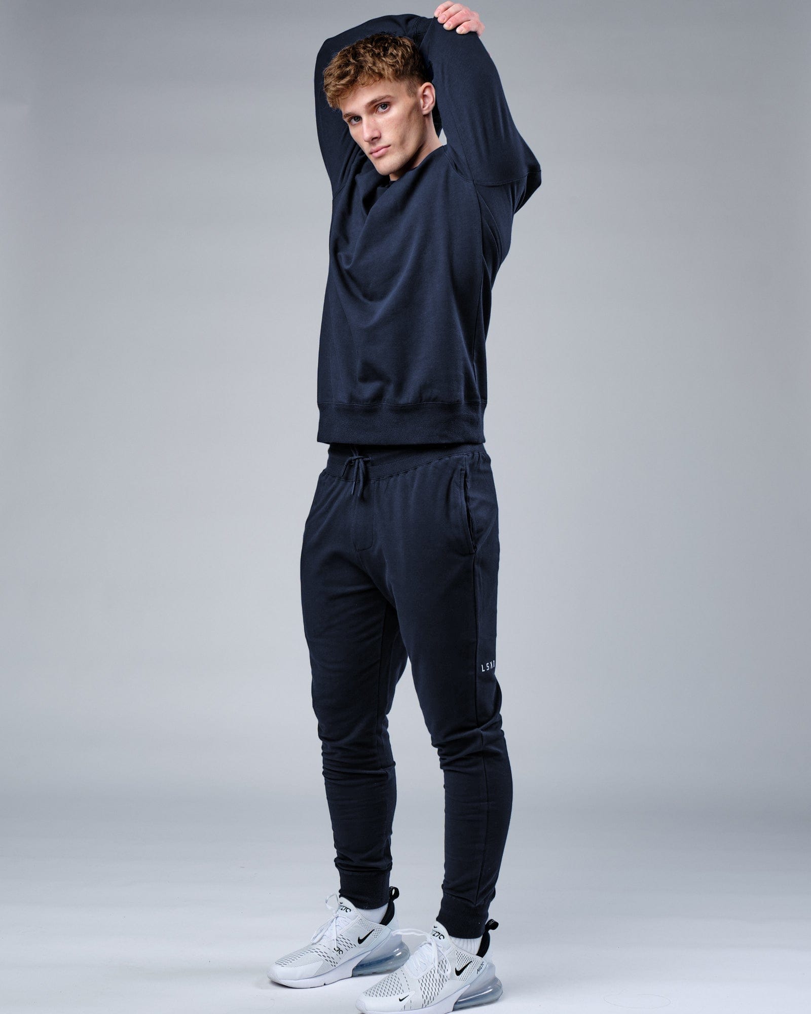 Model wearing Rival FLXFleece Track Pant - Carbon