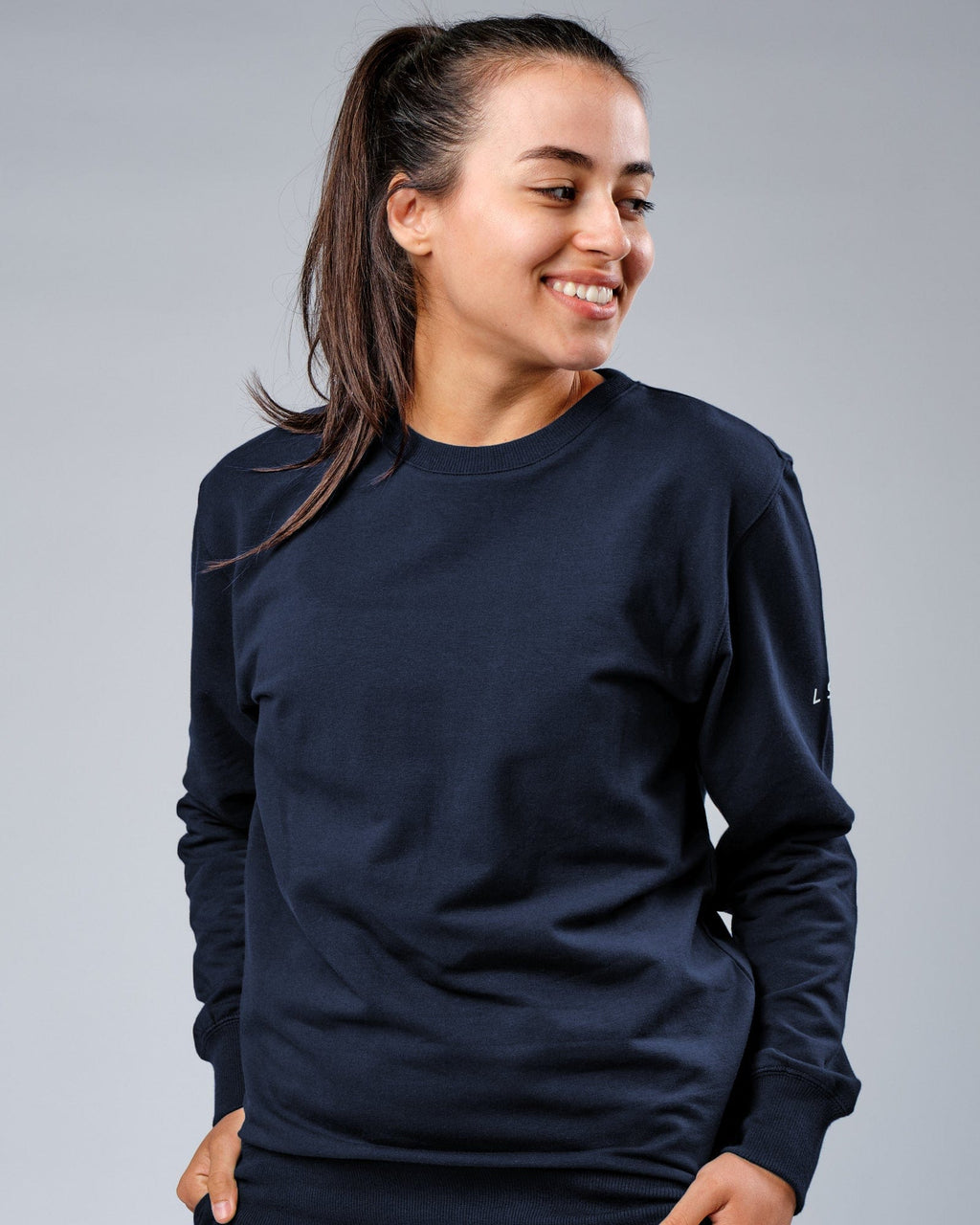 Model wearing Unisex Rival FLXFleece Training Fit Sweater - Carbon