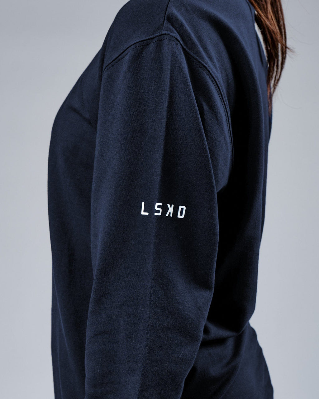 Model wearing Unisex Rival FLXFleece Training Fit Sweater - Carbon