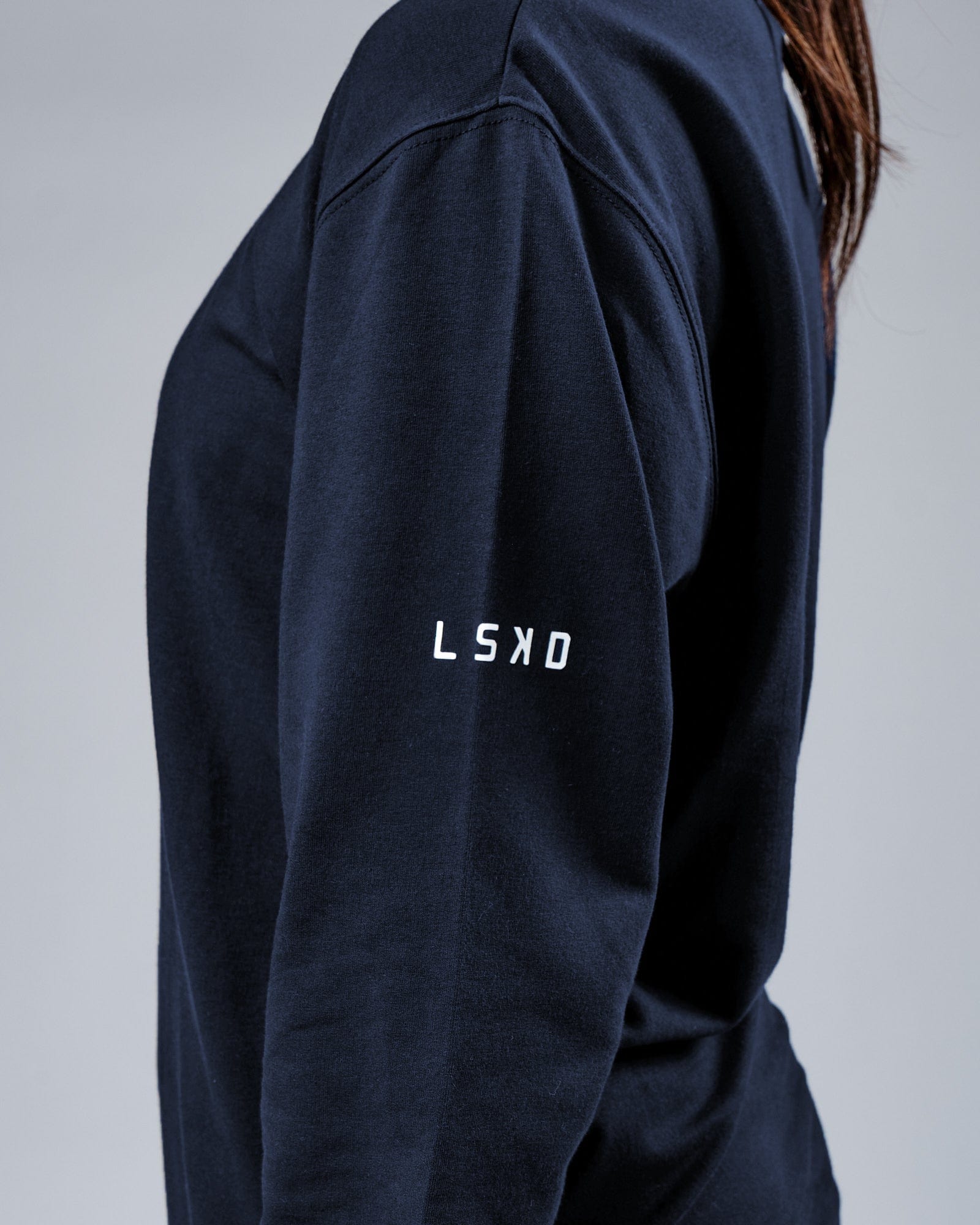 Model wearing Unisex Rival FLXFleece Training Fit Sweater - Carbon