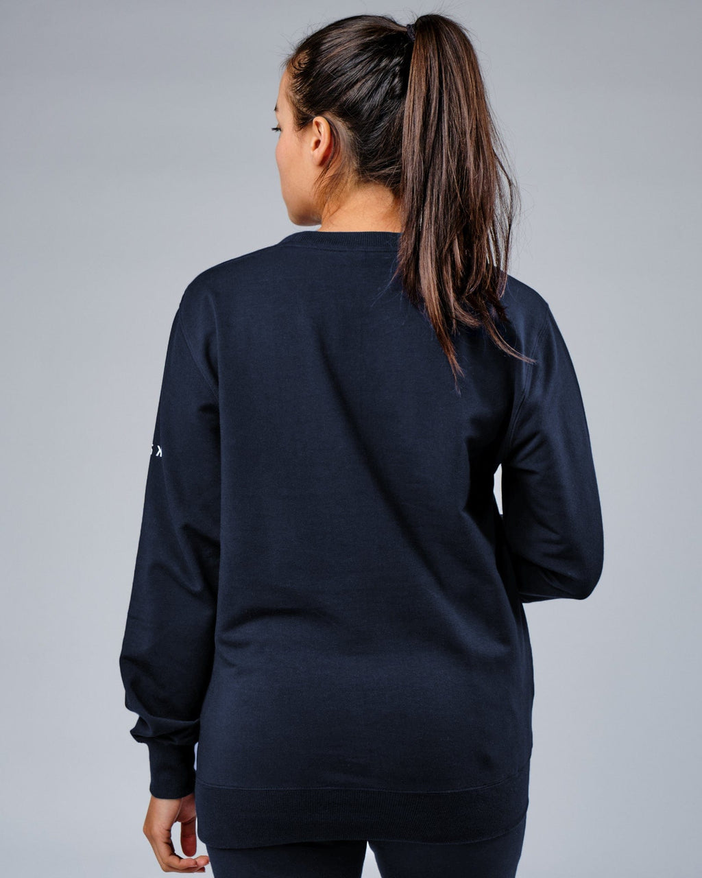 Model wearing Unisex Rival FLXFleece Training Fit Sweater - Carbon