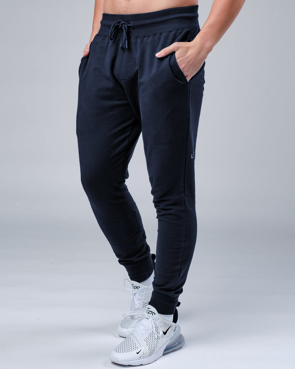 Model wearing Rival FLXFleece Track Pant - Carbon
