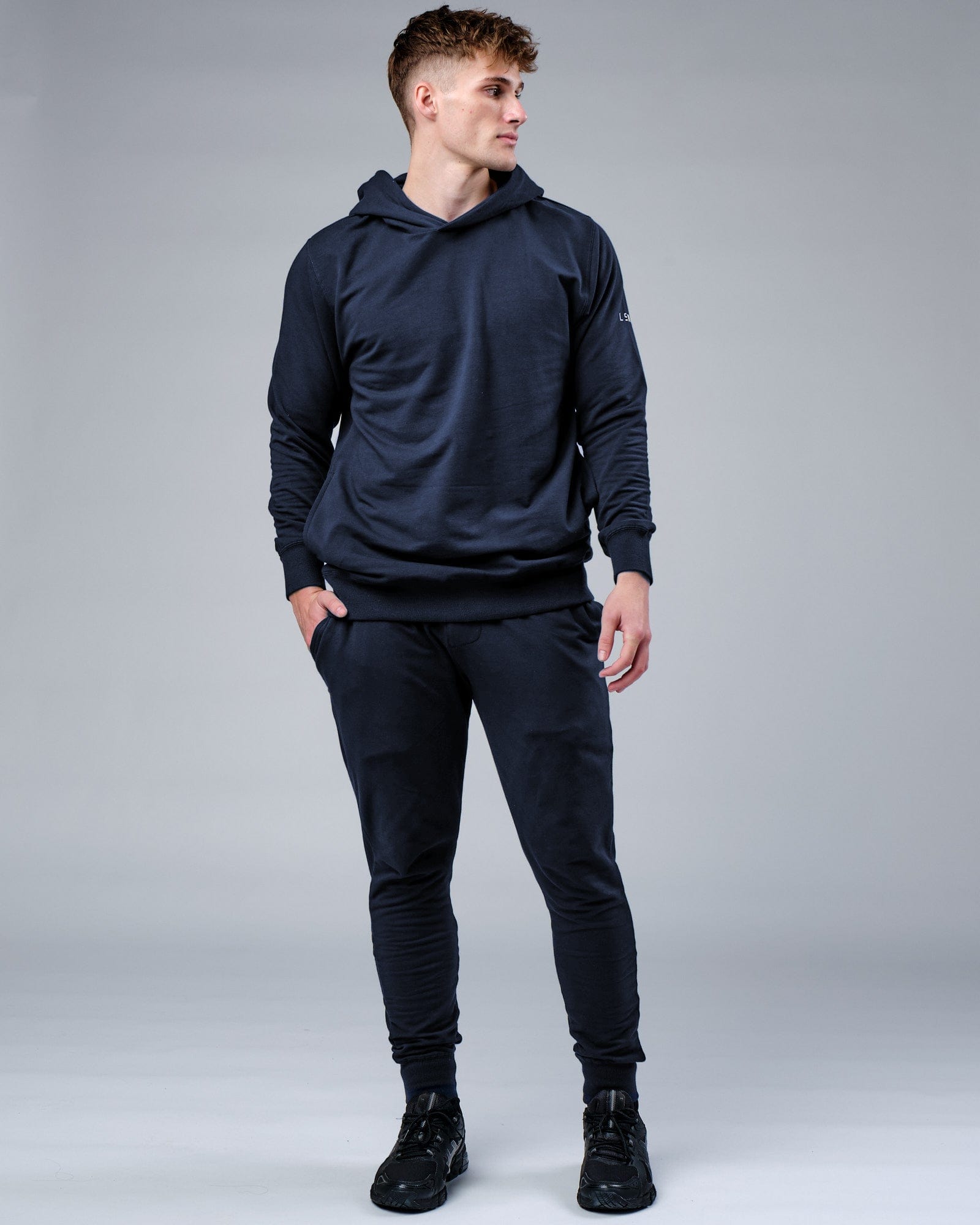 Model wearing Rival FLXFleece Training Fit Hoodie - Carbon