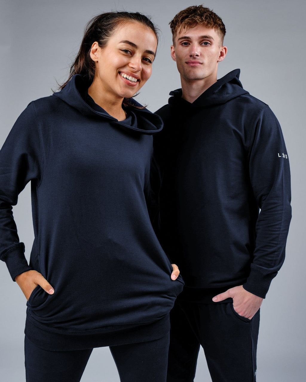 Model wearing Unisex Rival FLXFleece Training Fit Hoodie - Carbon