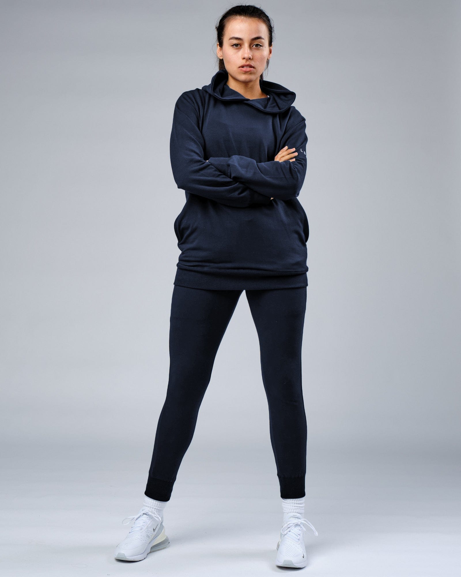 Model wearing Unisex Rival FLXFleece Training Fit Hoodie - Carbon