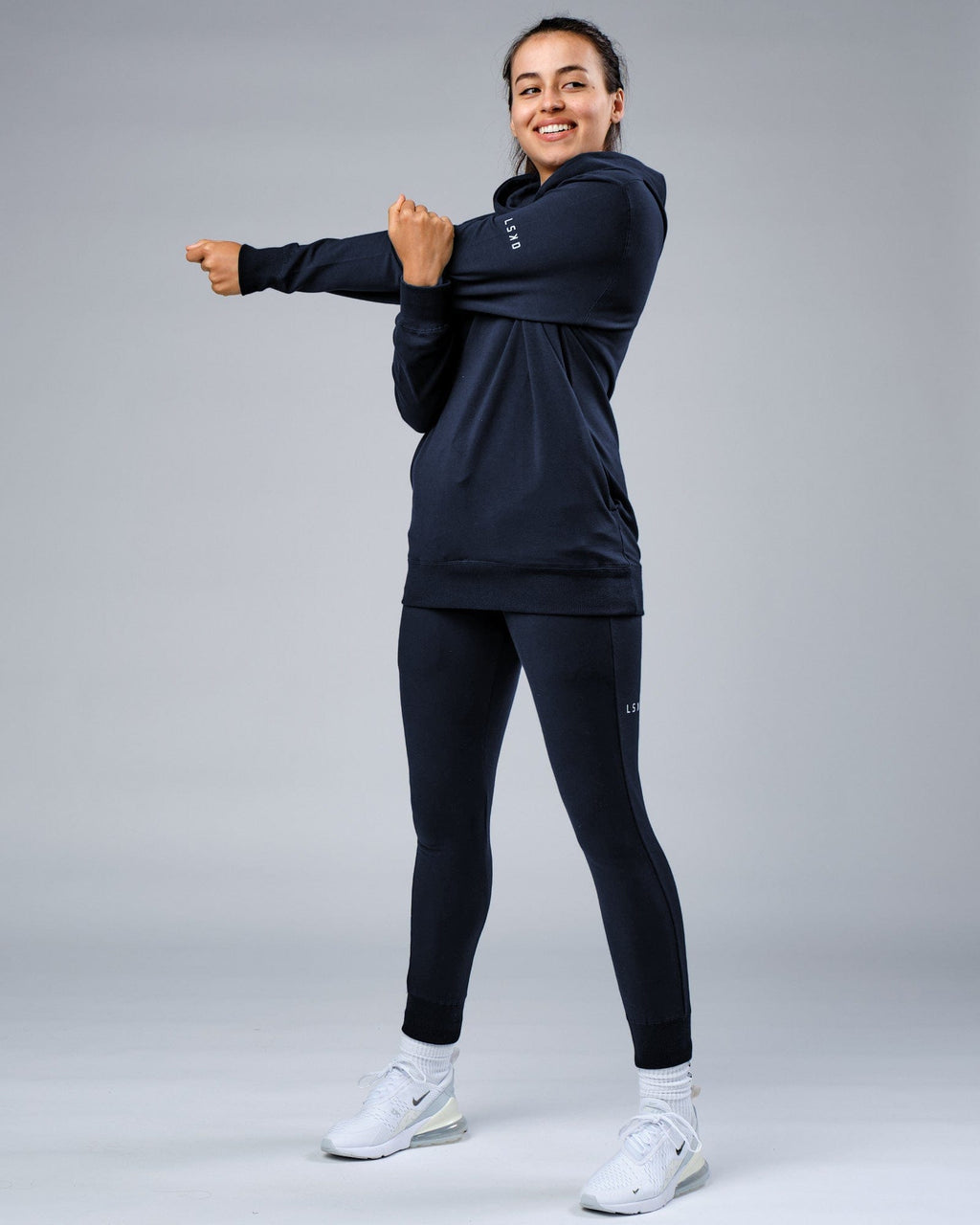 Model wearing Unisex Rival FLXFleece Training Fit Hoodie - Carbon