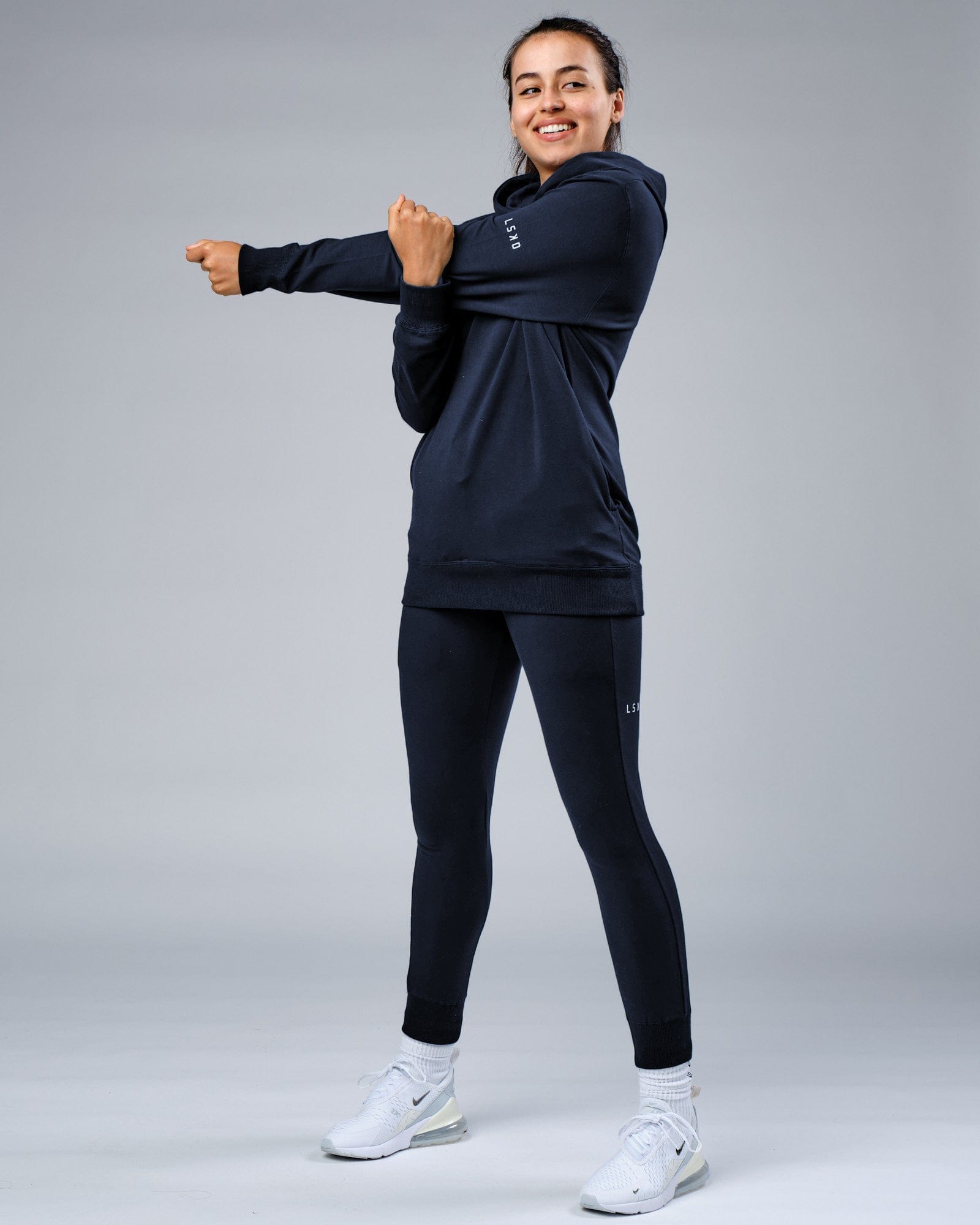 Model wearing Unisex Rival FLXFleece Training Fit Hoodie - Carbon