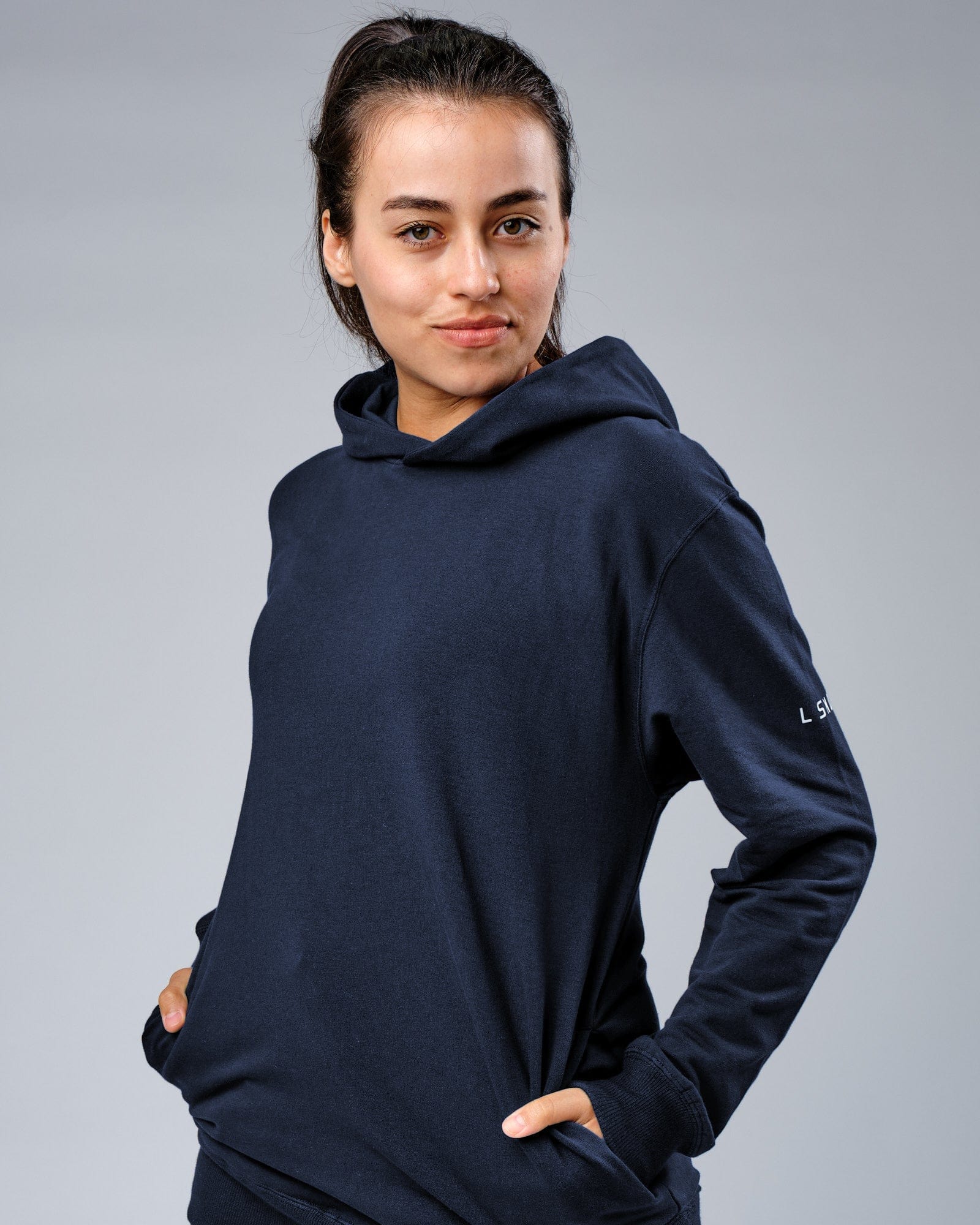 Model wearing Unisex Rival FLXFleece Training Fit Hoodie - Carbon