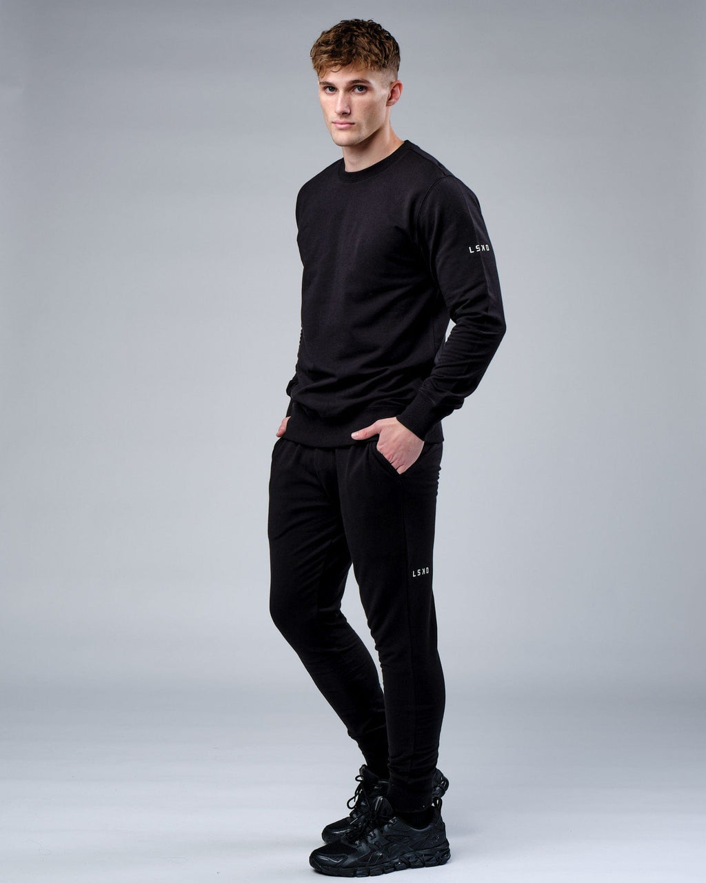 Model wearing Rival FLXFleece Track Pant - Black
