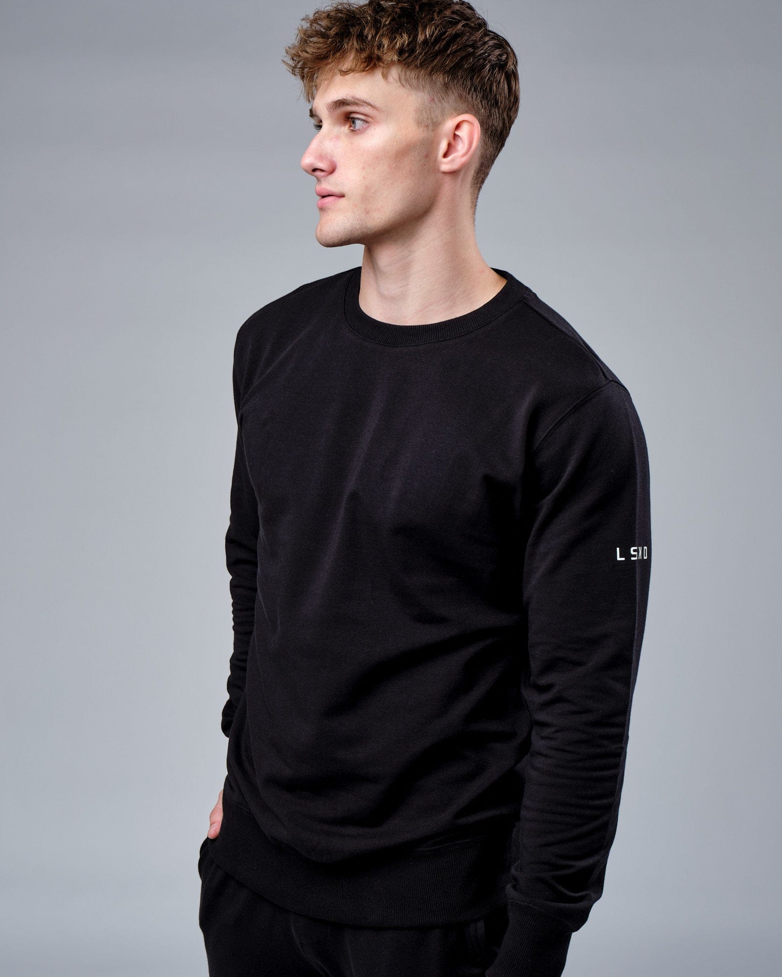 Model wearing Rival FLXFleece Training Fit Sweater - Black