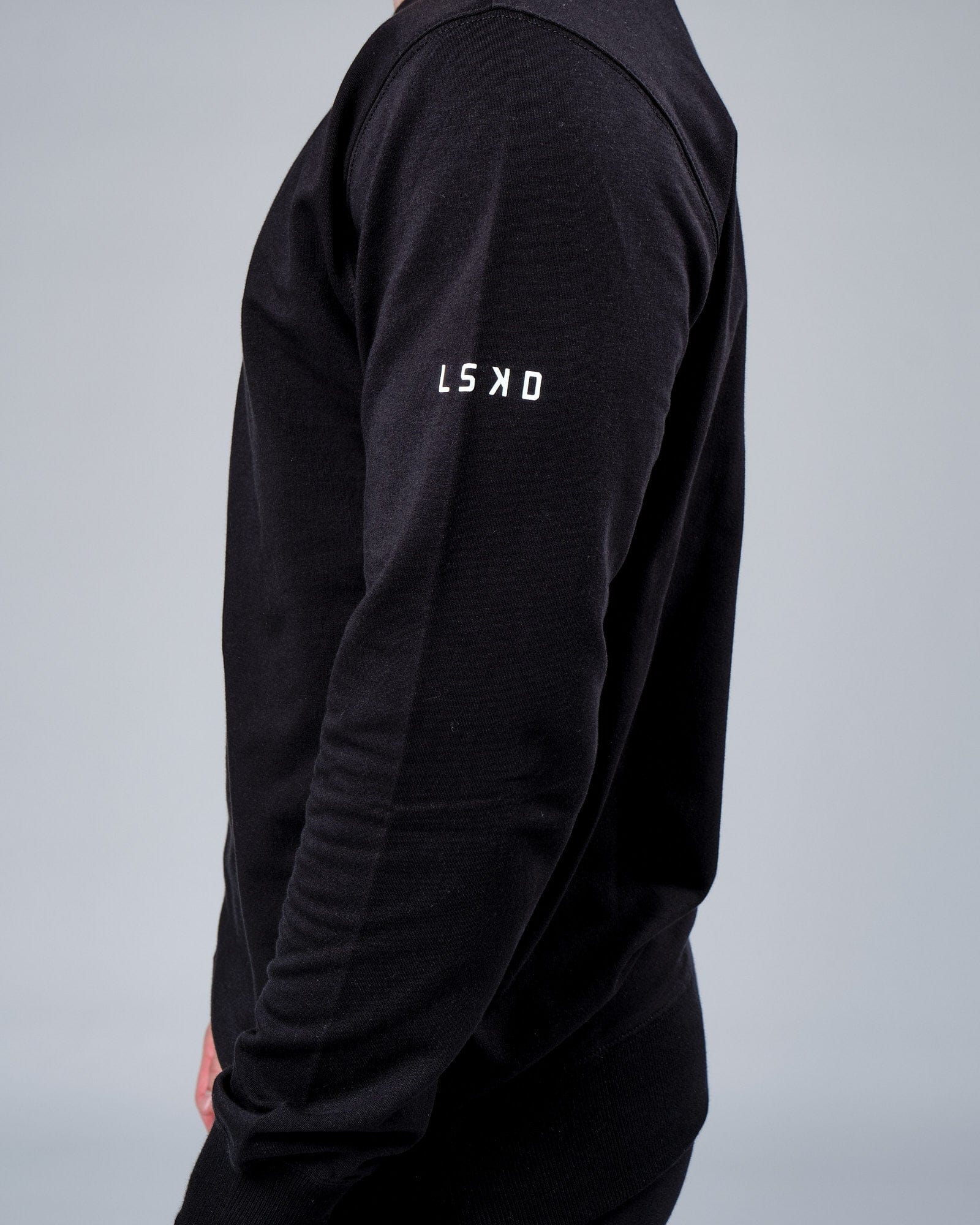 Model wearing Rival FLXFleece Training Fit Sweater - Black