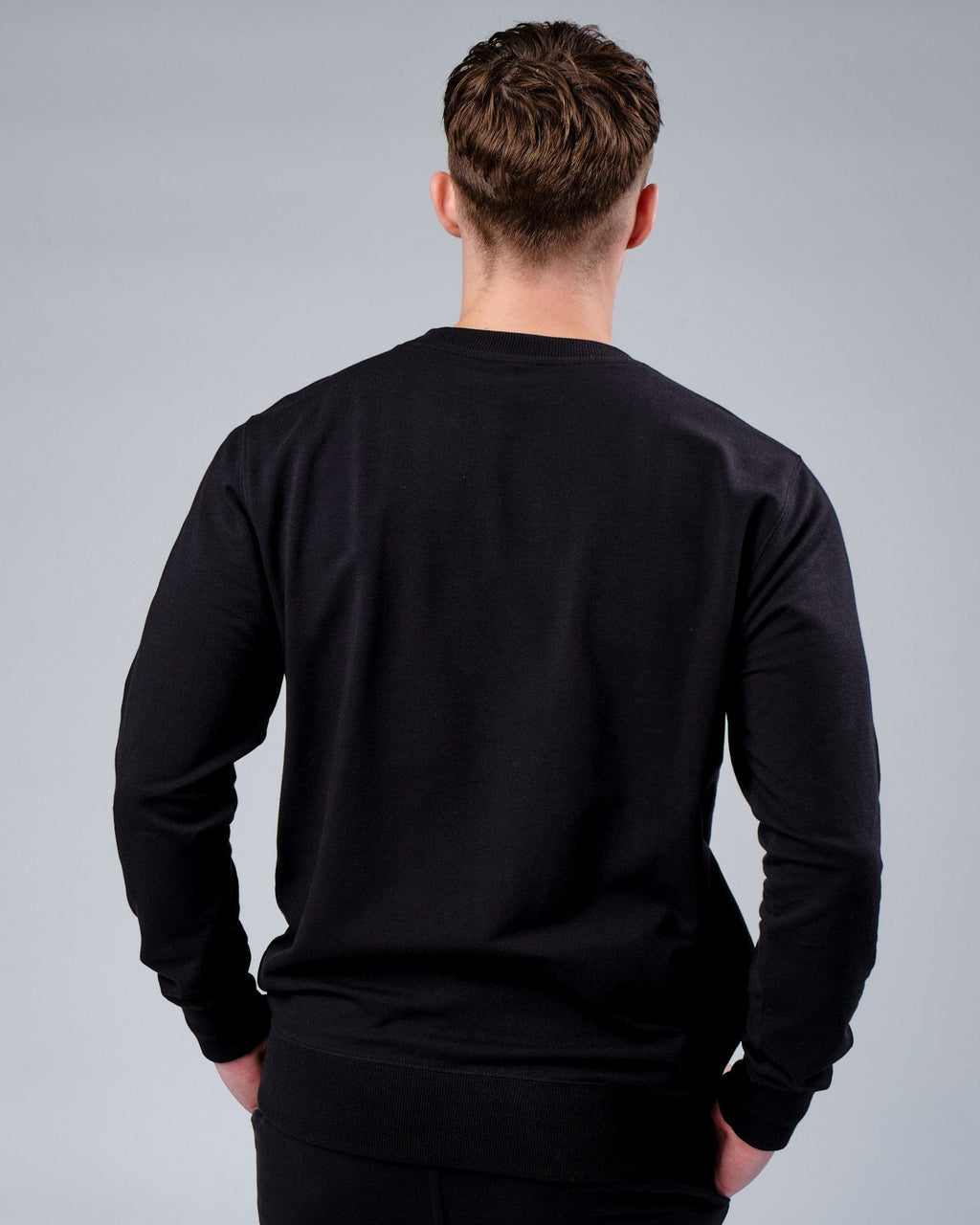 Model wearing Rival FLXFleece Training Fit Sweater - Black