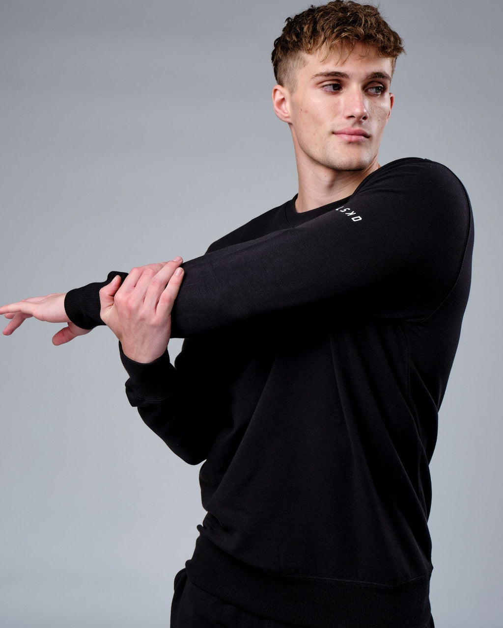 Model wearing Rival FLXFleece Training Fit Sweater - Black