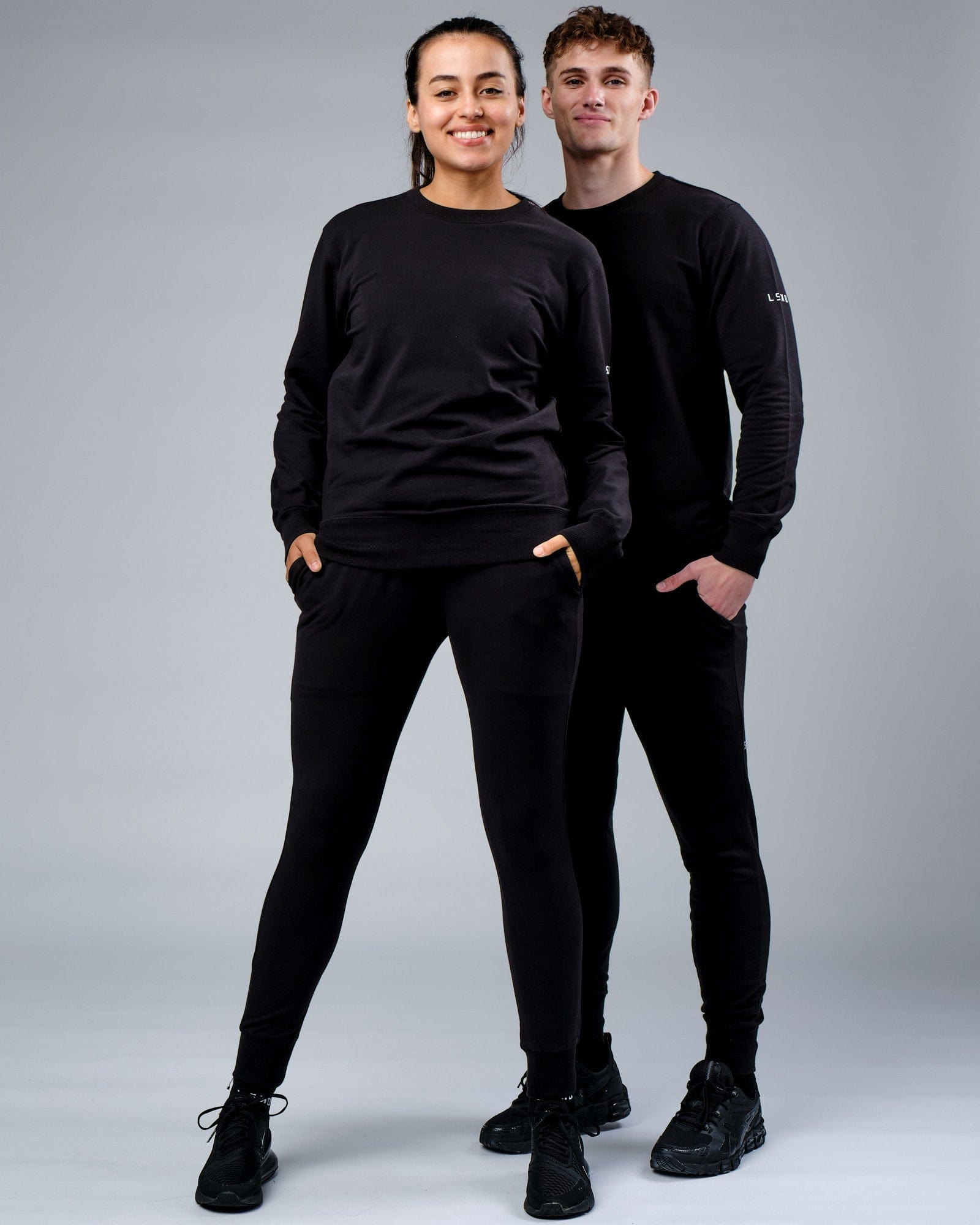 Model wearing Unisex Rival FLXFleece Training Fit Sweater - Black