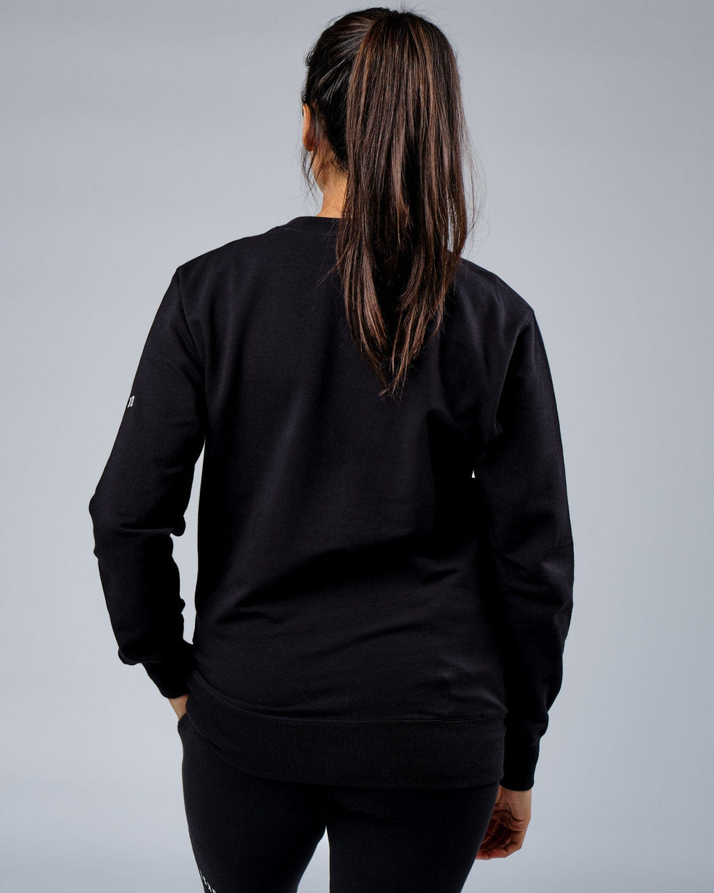 Model wearing Unisex Rival FLXFleece Training Fit Sweater - Black