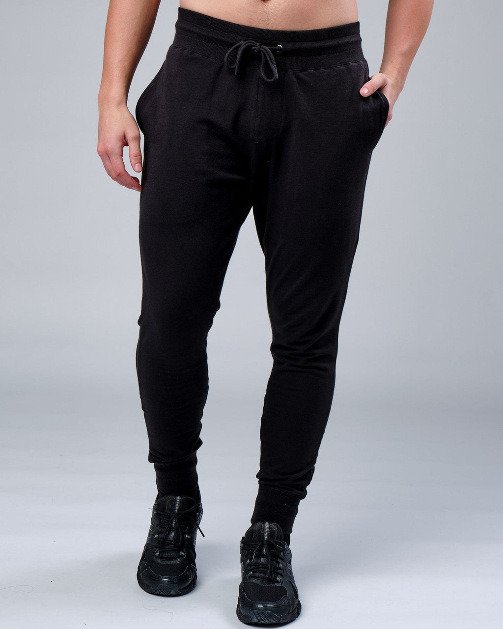 Model wearing Rival FLXFleece Track Pant - Black