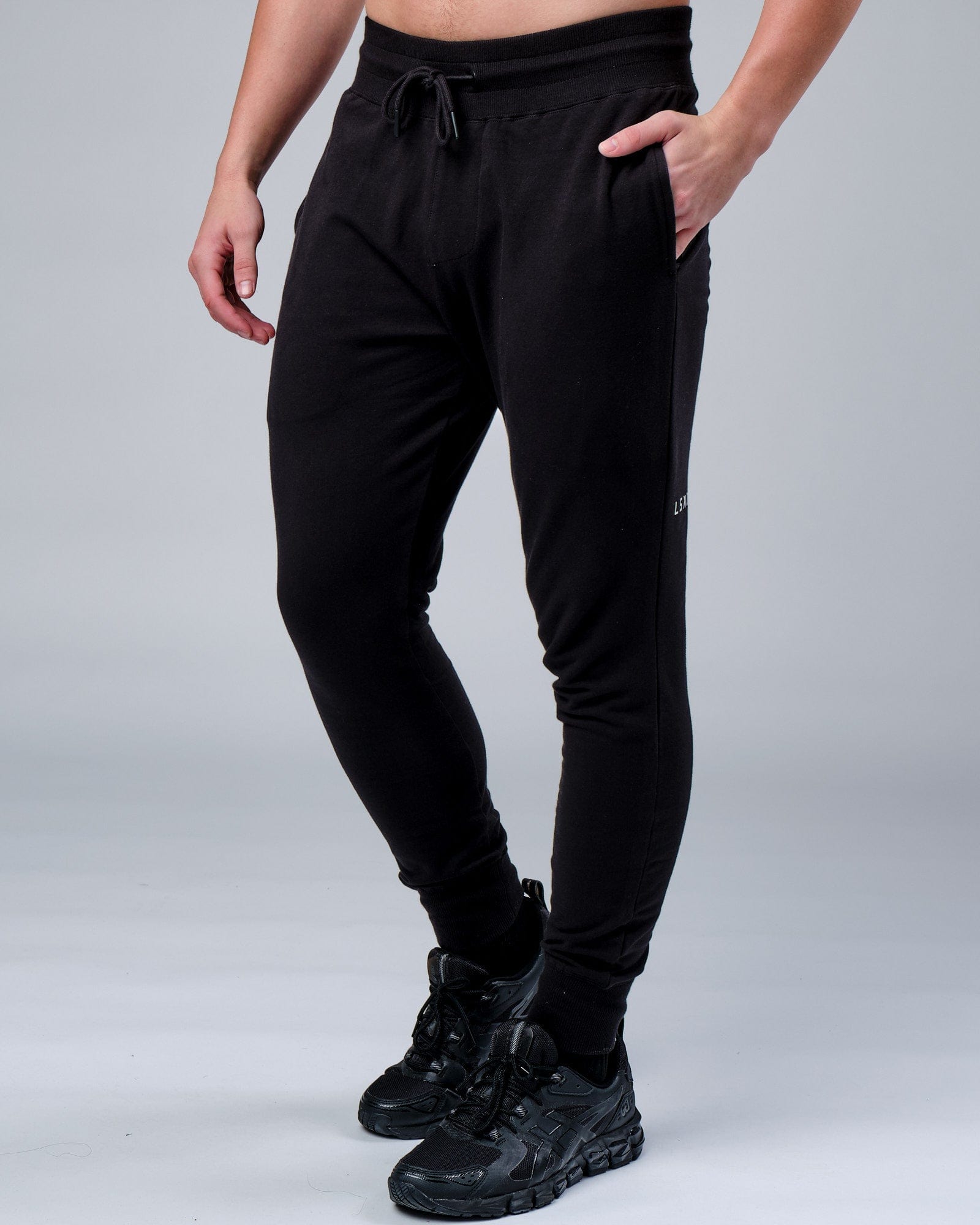 Model wearing Rival FLXFleece Track Pant - Black