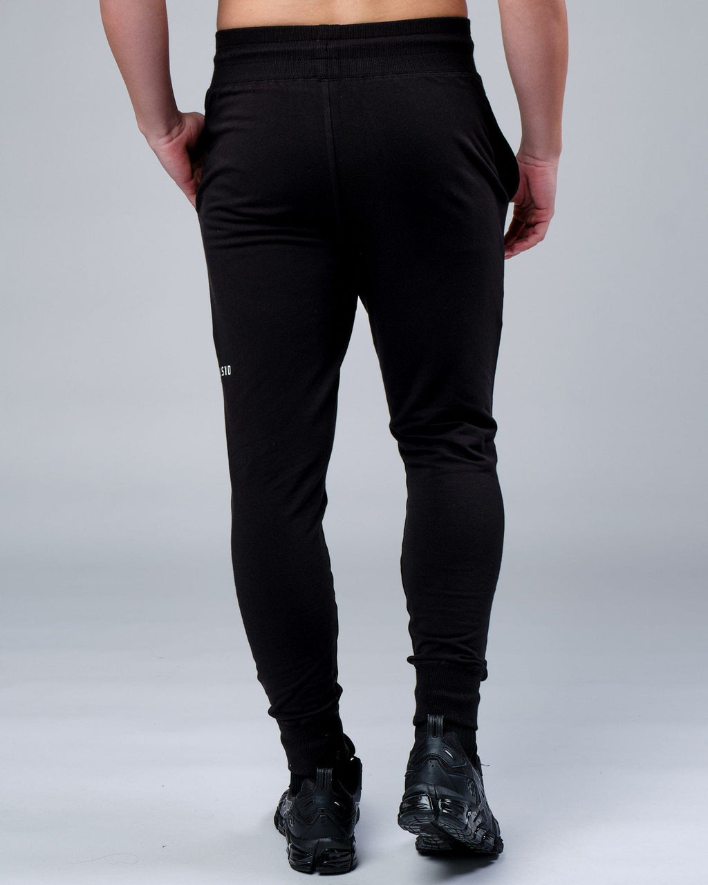 Model wearing Rival FLXFleece Track Pant - Black
