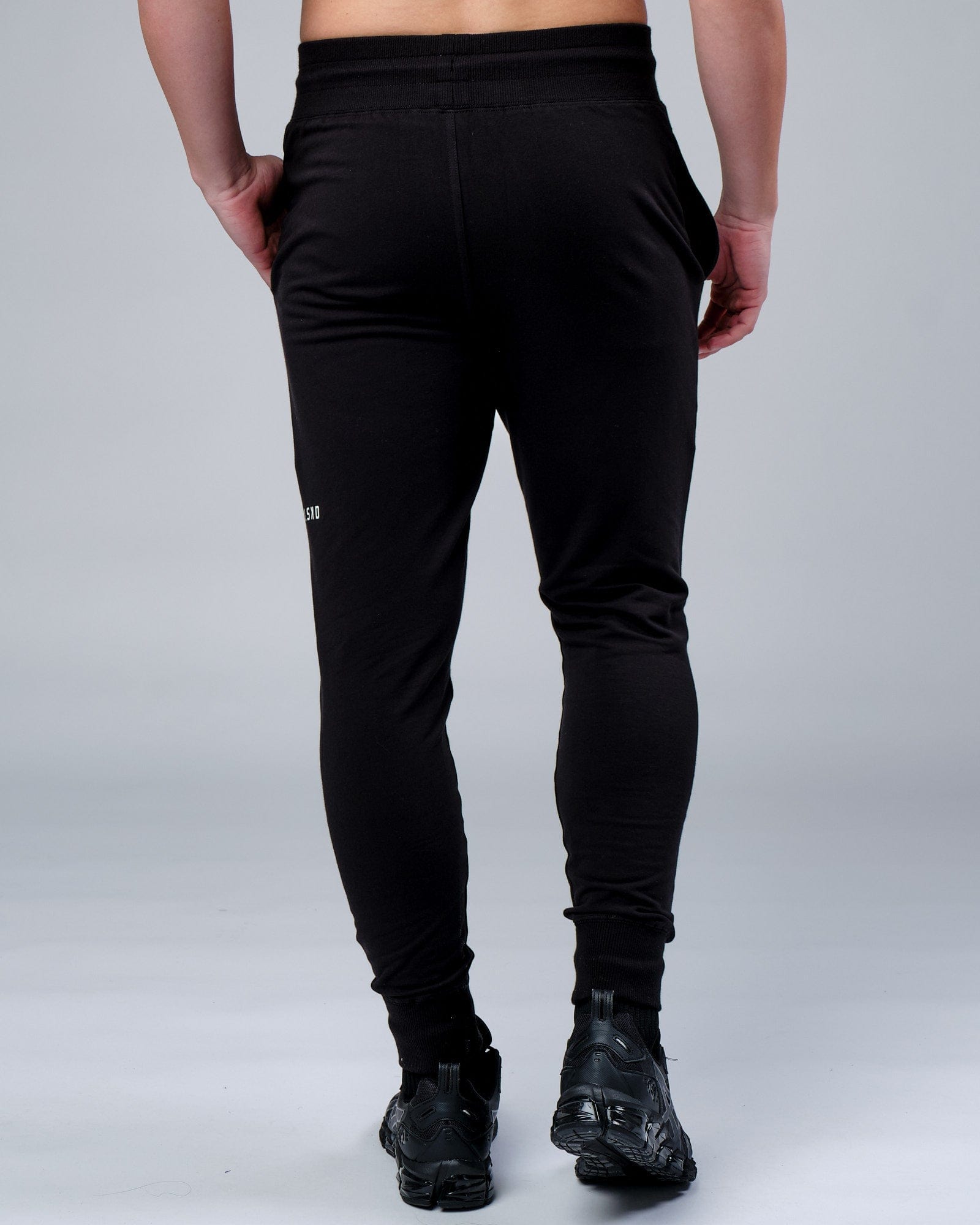Model wearing Rival FLXFleece Track Pant - Black