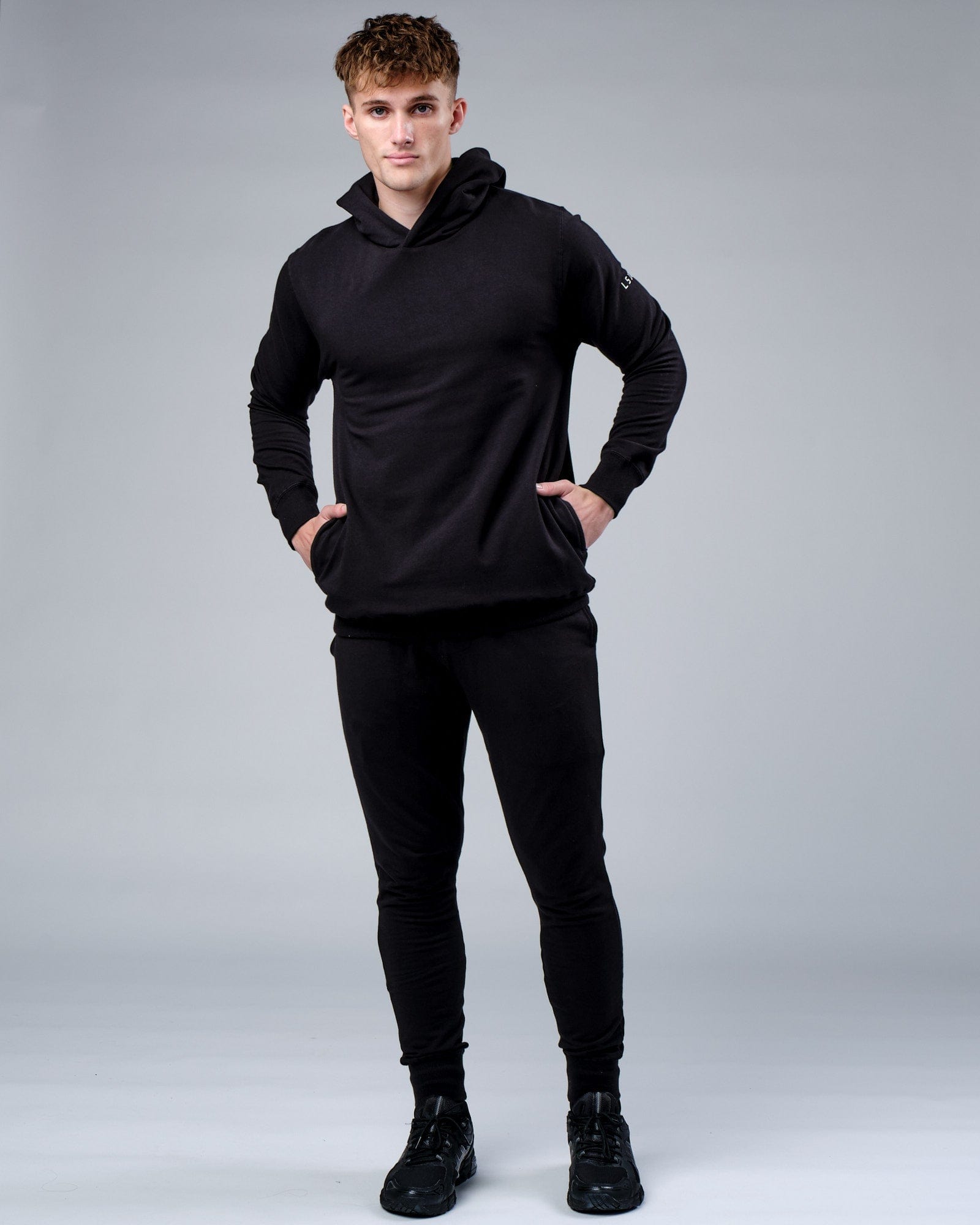 Model wearing Rival FLXFleece Training Fit Hoodie - Black