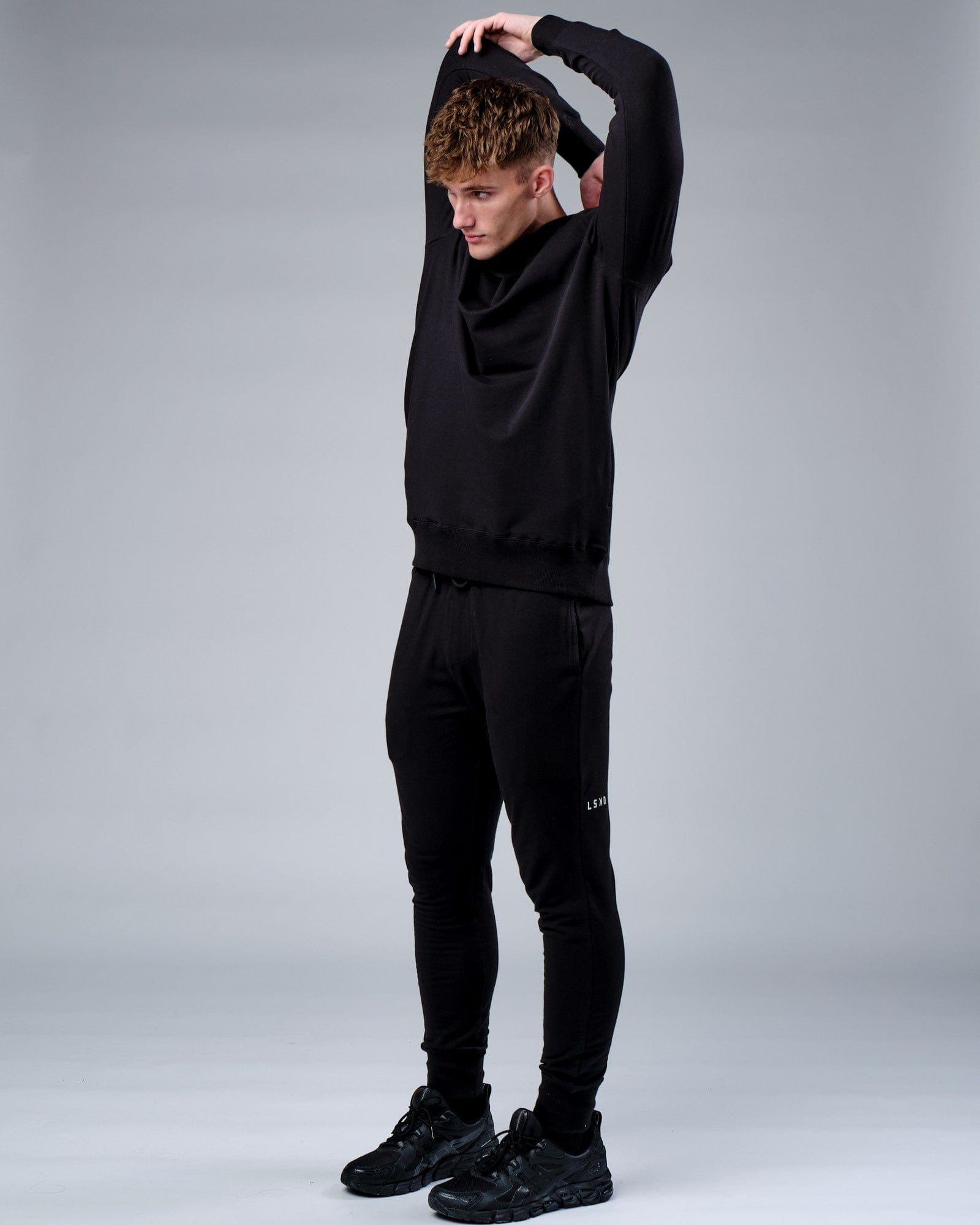 Model wearing Rival FLXFleece Training Fit Hoodie - Black
