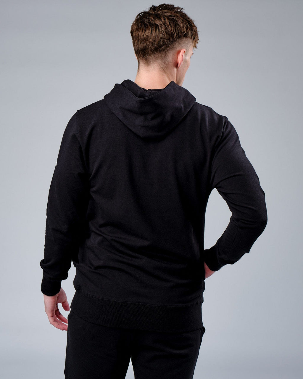 Model wearing Rival FLXFleece Training Fit Hoodie - Black