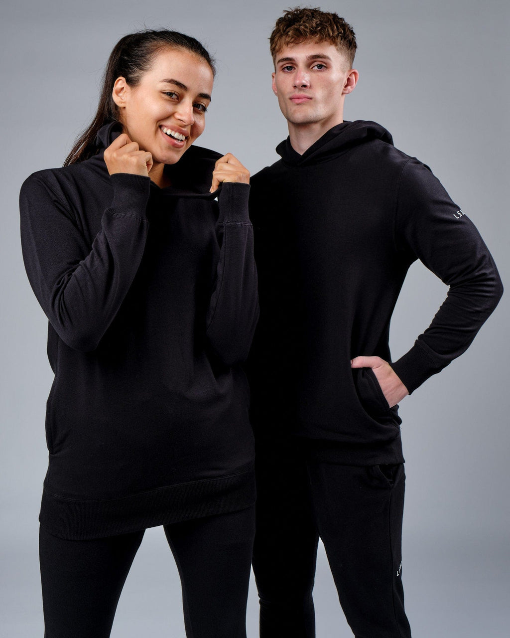 Model wearing Unisex Rival FLXFleece Training Fit Hoodie - Black