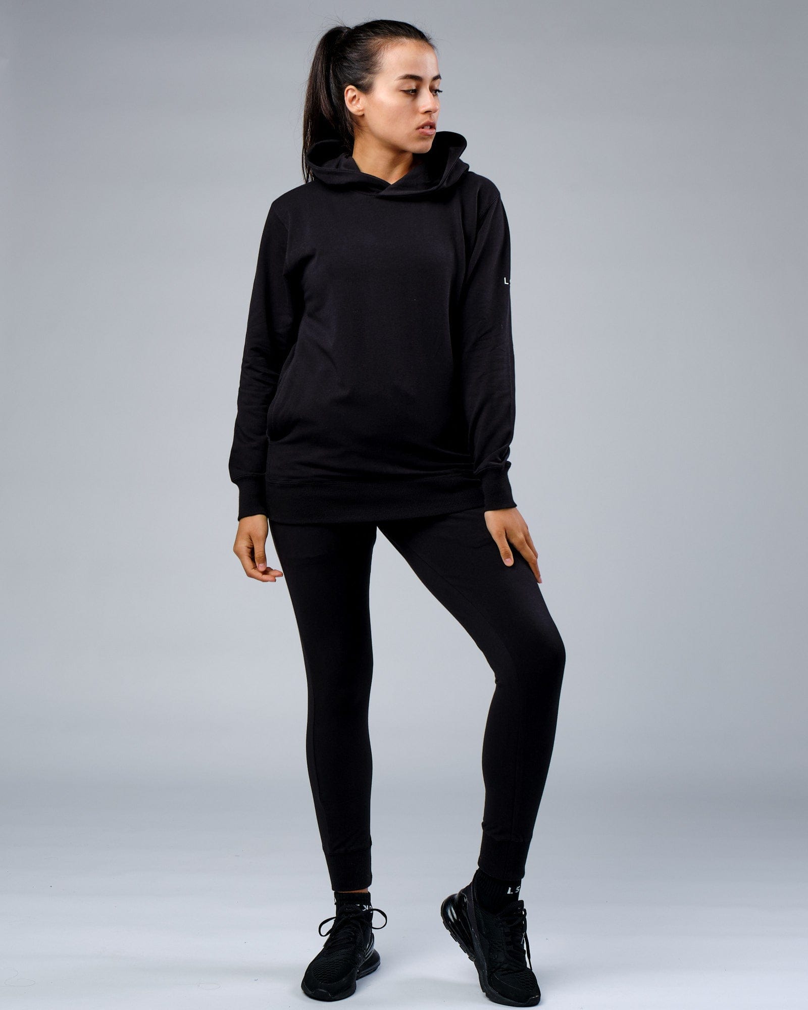 Model wearing Unisex Rival FLXFleece Training Fit Hoodie - Black